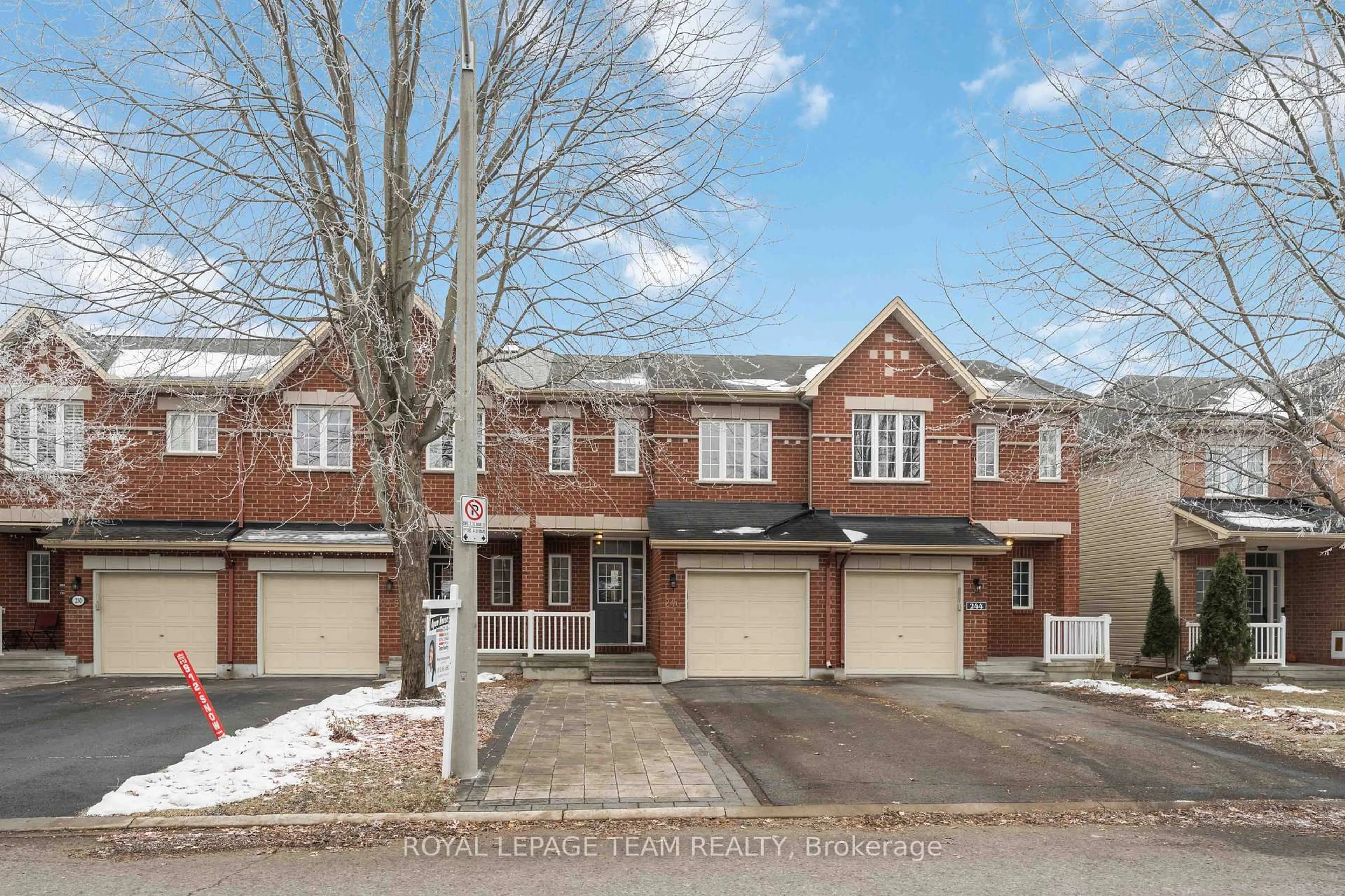 Home with brick exterior material, street for 246 Tandalee Cres, Ottawa Ontario K2M 0A1