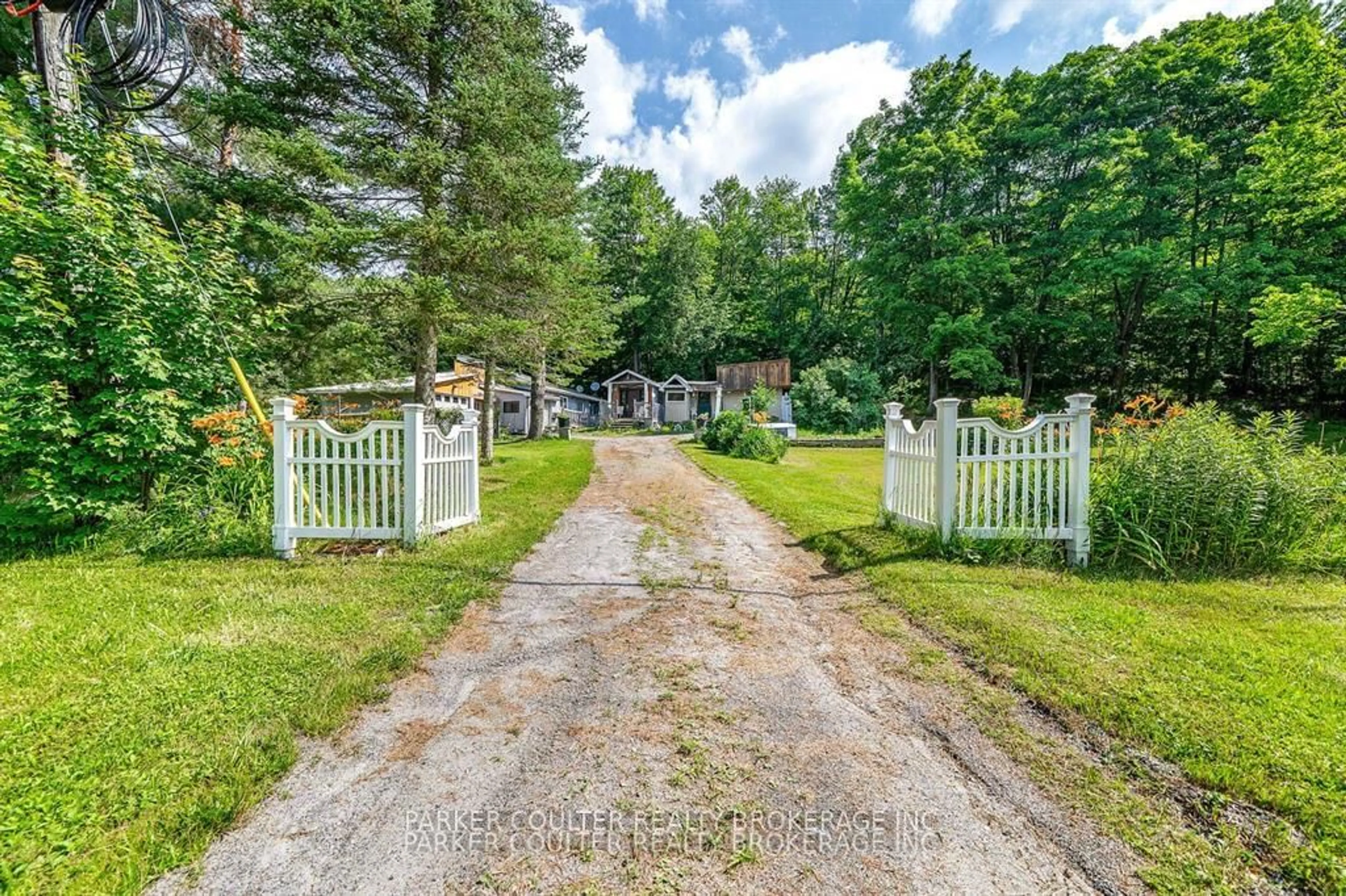 A pic from outside/outdoor area/front of a property/back of a property/a pic from drone, street for 1291 Muskoka Rd 118, Bracebridge Ontario P1L 1W8