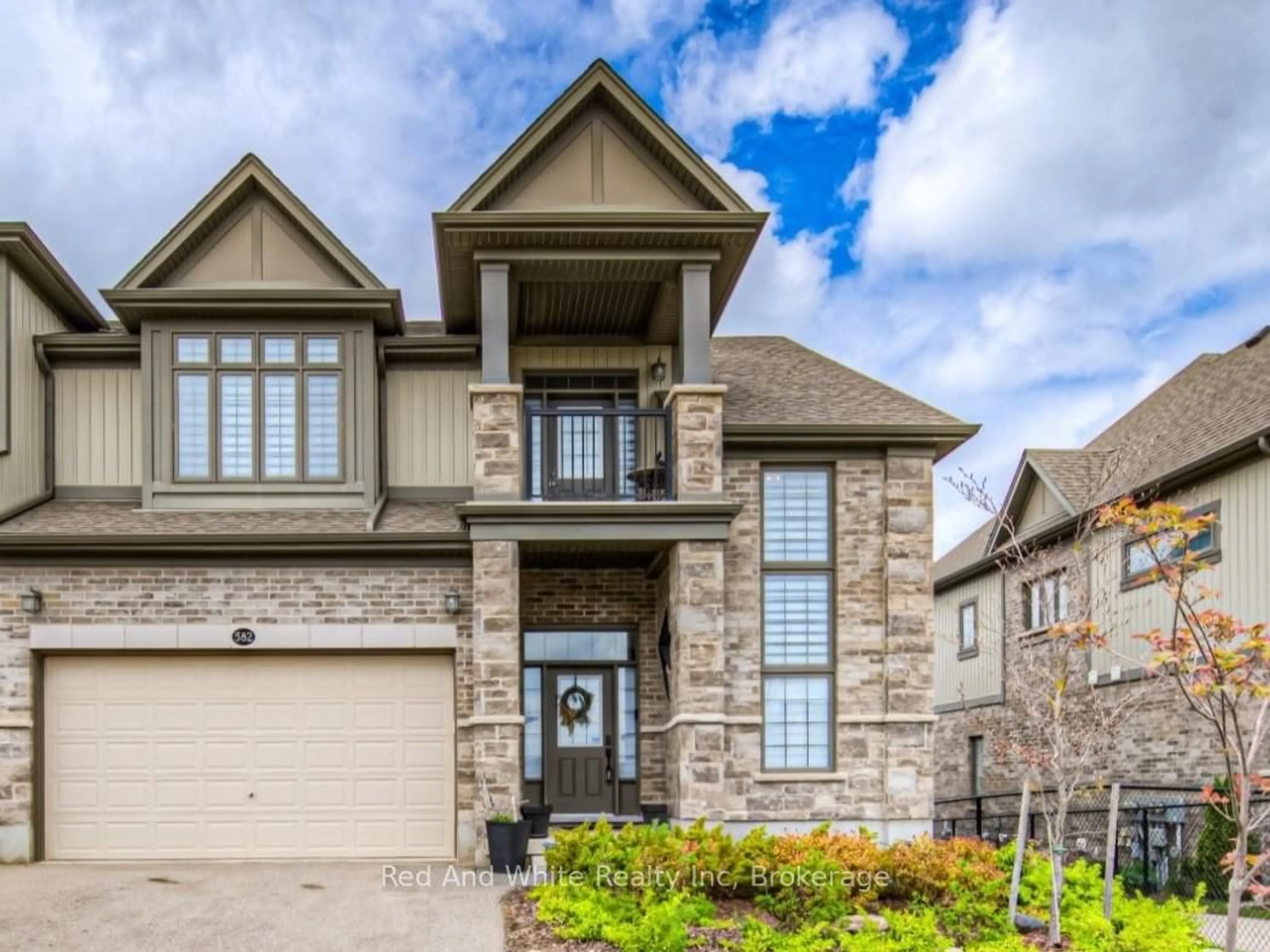 Home with brick exterior material, street for 582 Mayapple St, Waterloo Ontario N2V 0E3