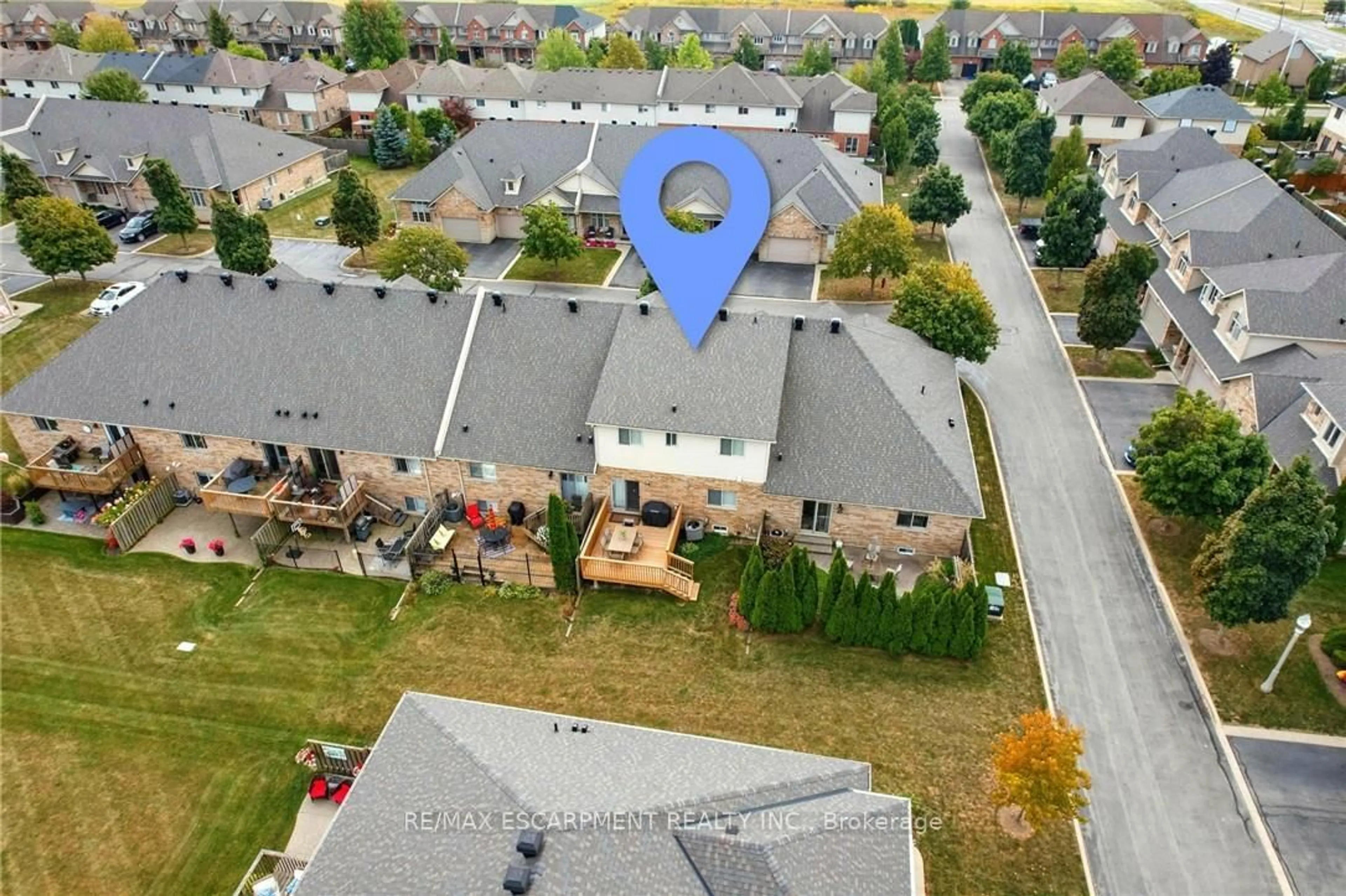 A pic from outside/outdoor area/front of a property/back of a property/a pic from drone, unknown for 310 Southbrook Dr #20, Hamilton Ontario L0R 1C0