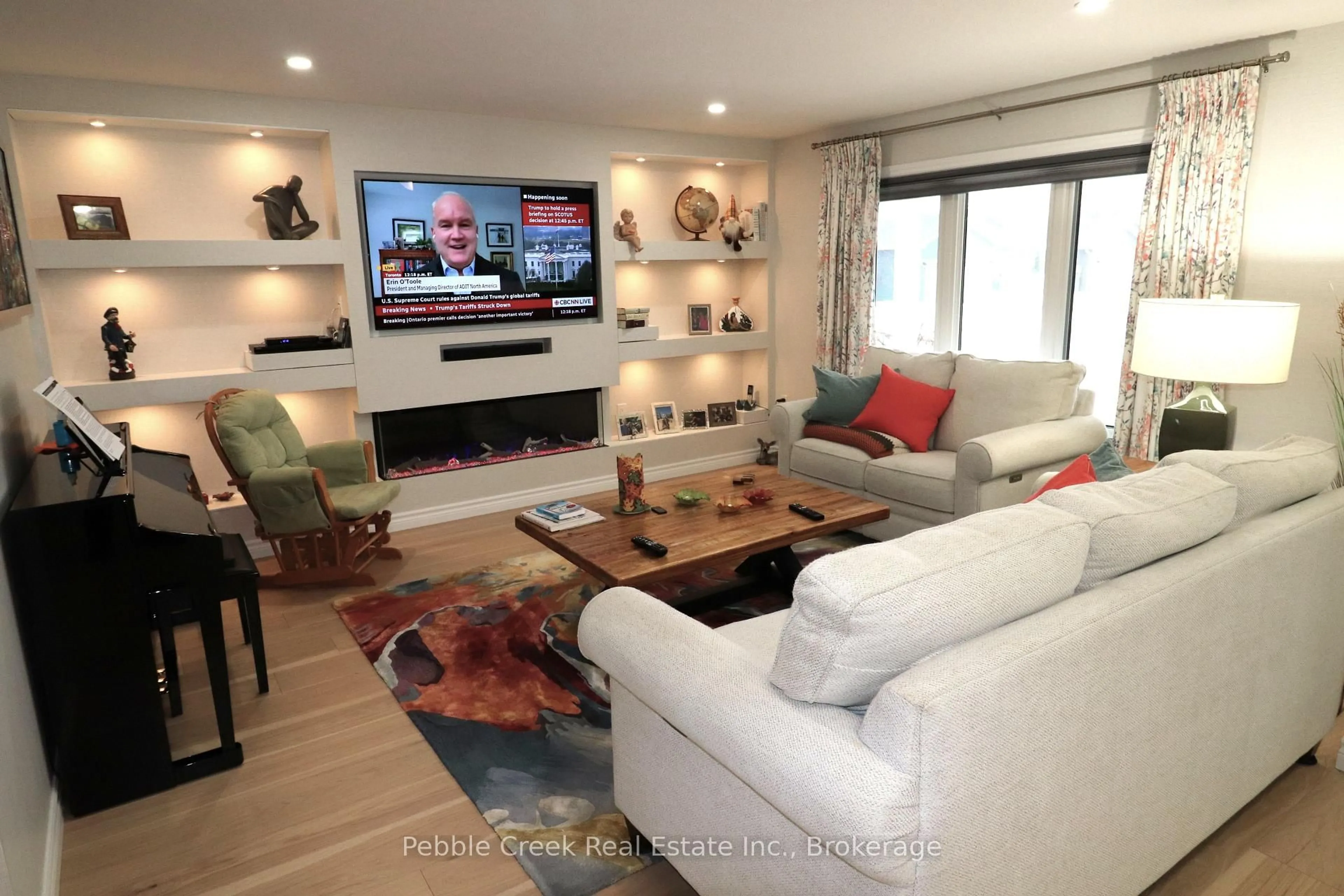 Living room with furniture, wood/laminate floor for 16 Sweet Water Dr, Ashfield-Colborne-Wawanosh Ontario N7A 0B9