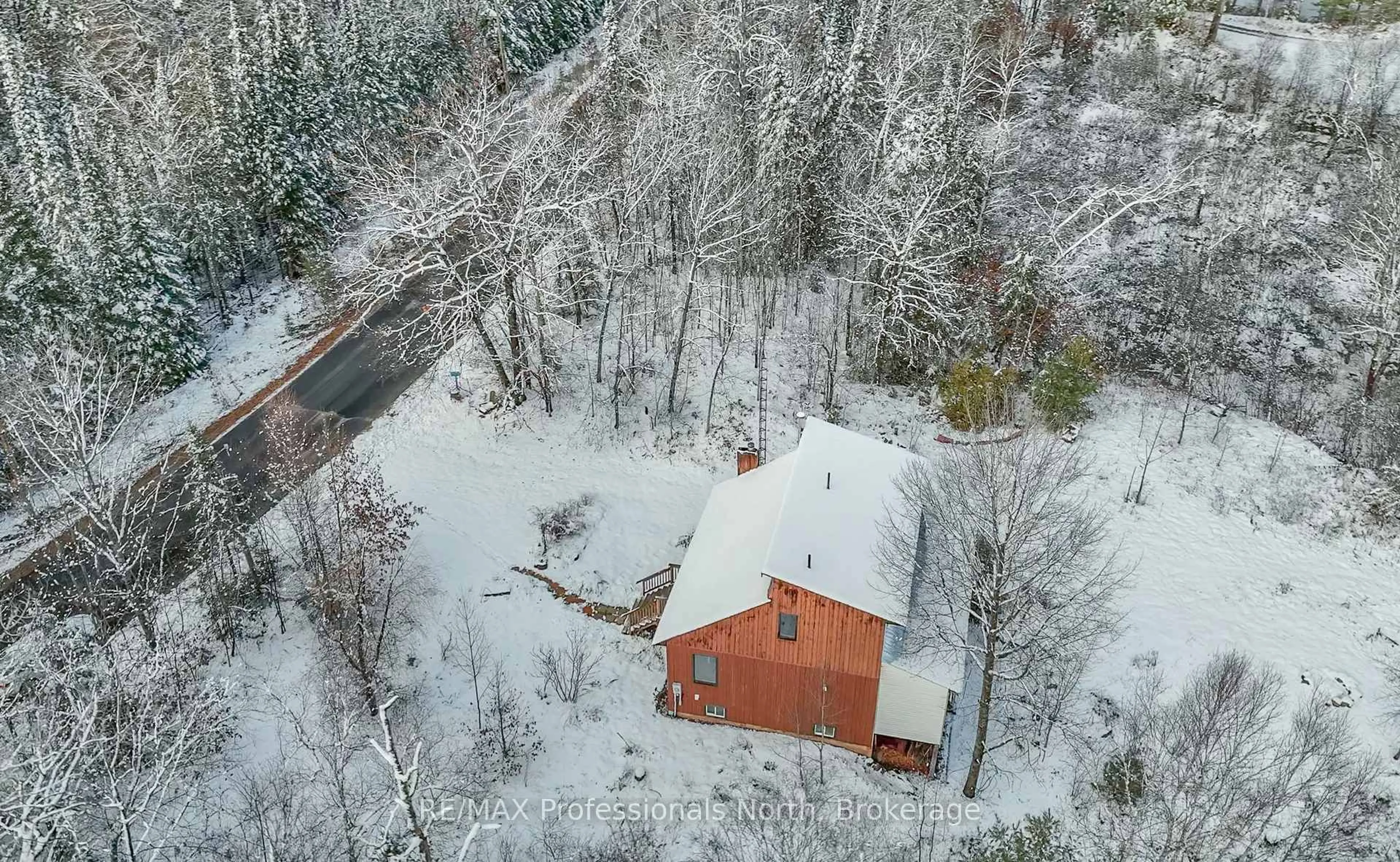 A pic from outside/outdoor area/front of a property/back of a property/a pic from drone, unknown for 1125 Fairy Falls Rd, Lake of Bays Ontario P0B 1A0