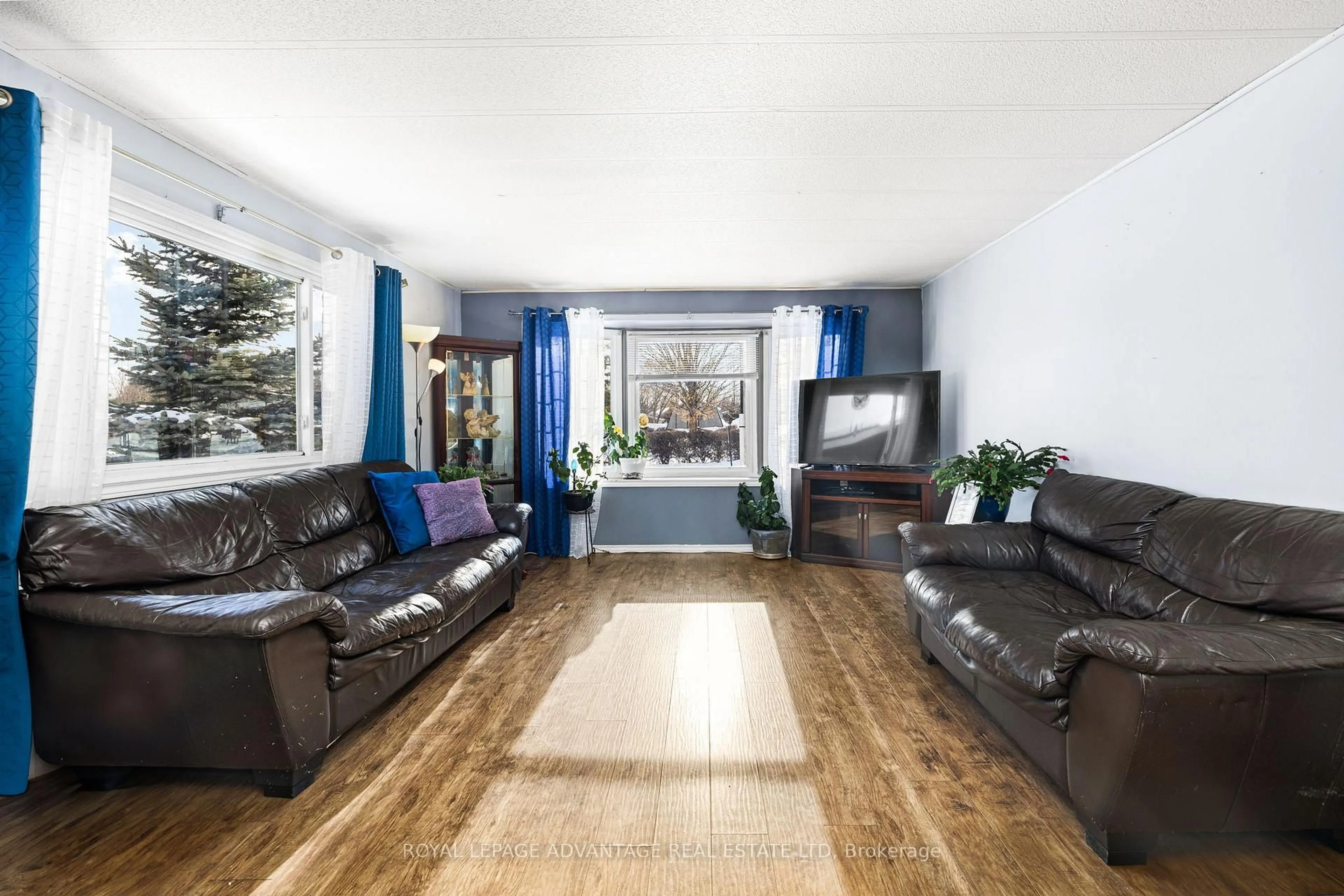 Living room with furniture, wood/laminate floor for 4 Kavanagh Dr, Rideau Lakes Ontario K7A 4S5