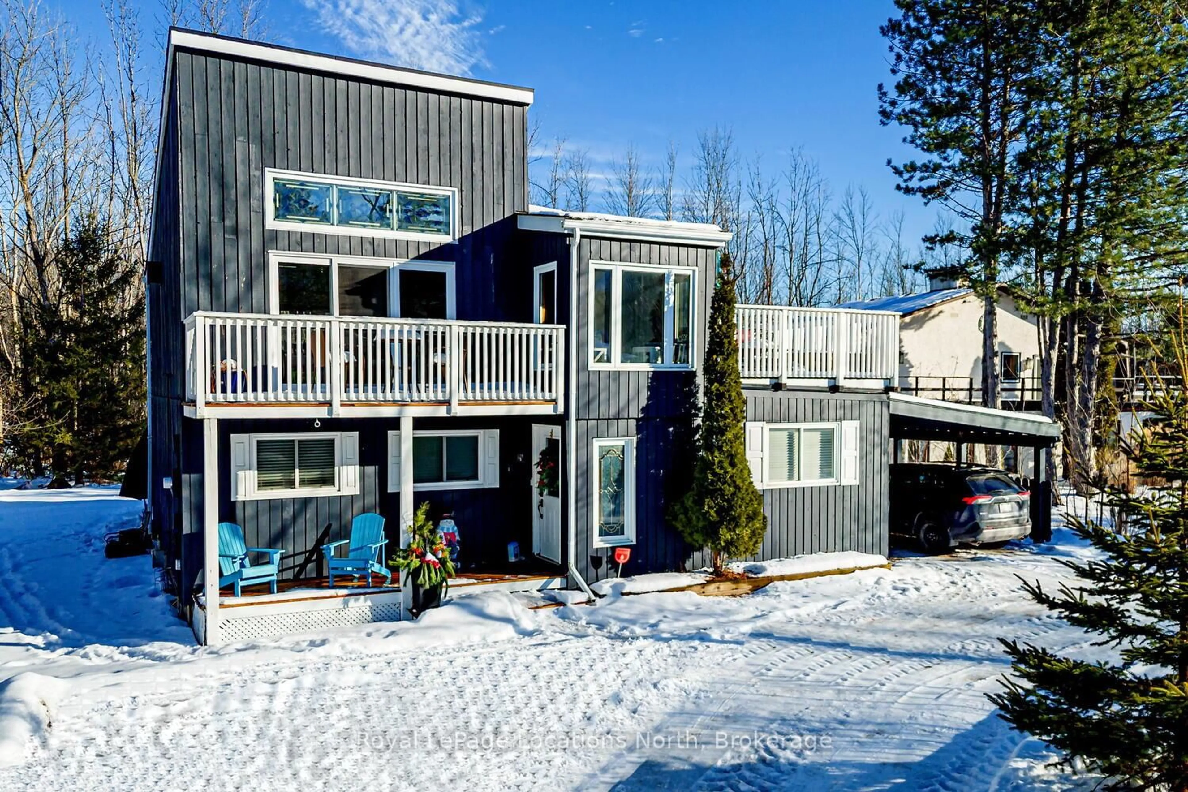 A pic from outside/outdoor area/front of a property/back of a property/a pic from drone, mountain view for 111 Martin Grve, Blue Mountains Ontario L9Y 0N5