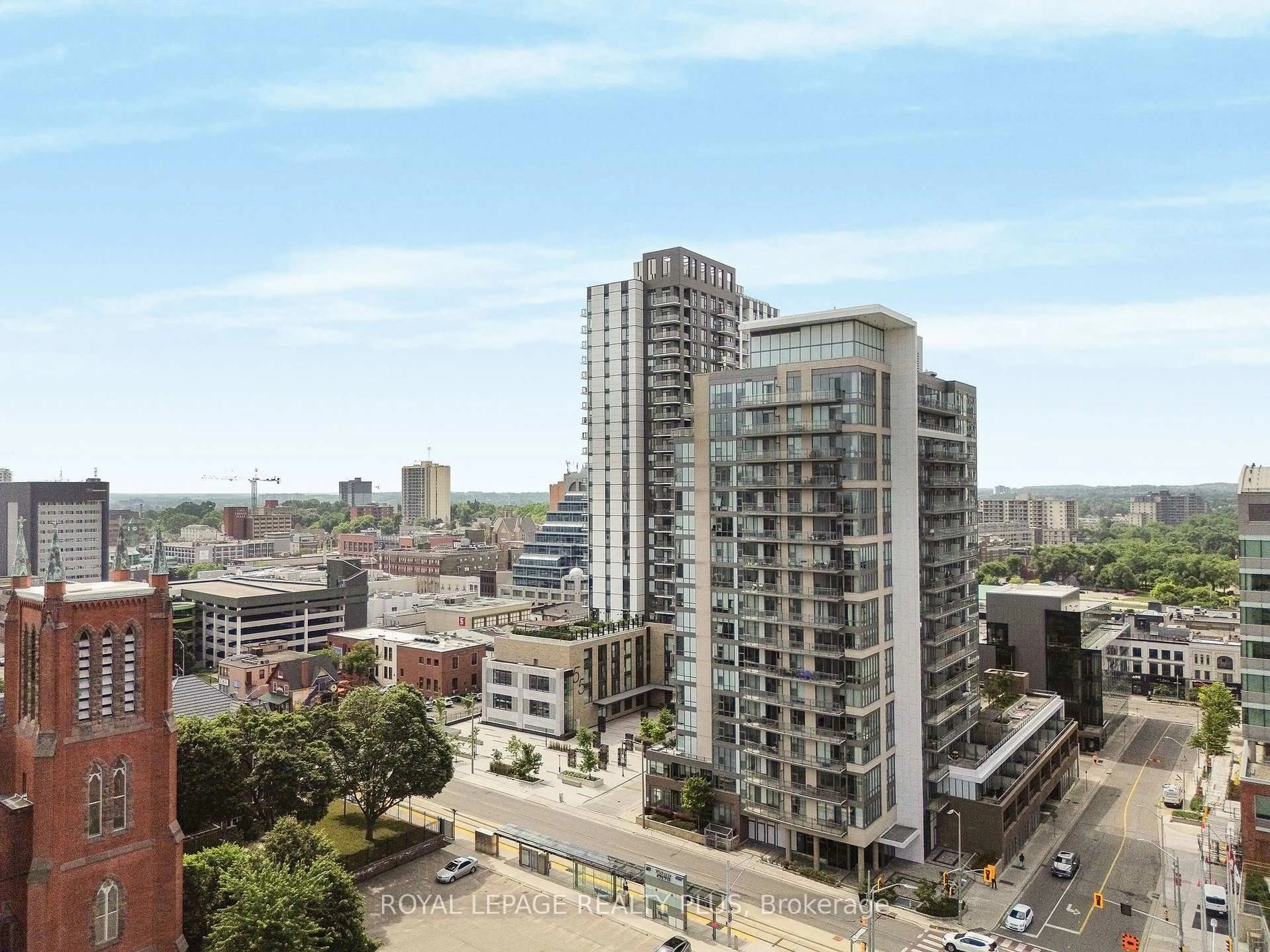 A pic from outside/outdoor area/front of a property/back of a property/a pic from drone, city buildings view from balcony for 55 Duke St #233, Kitchener Ontario N2H 0C9