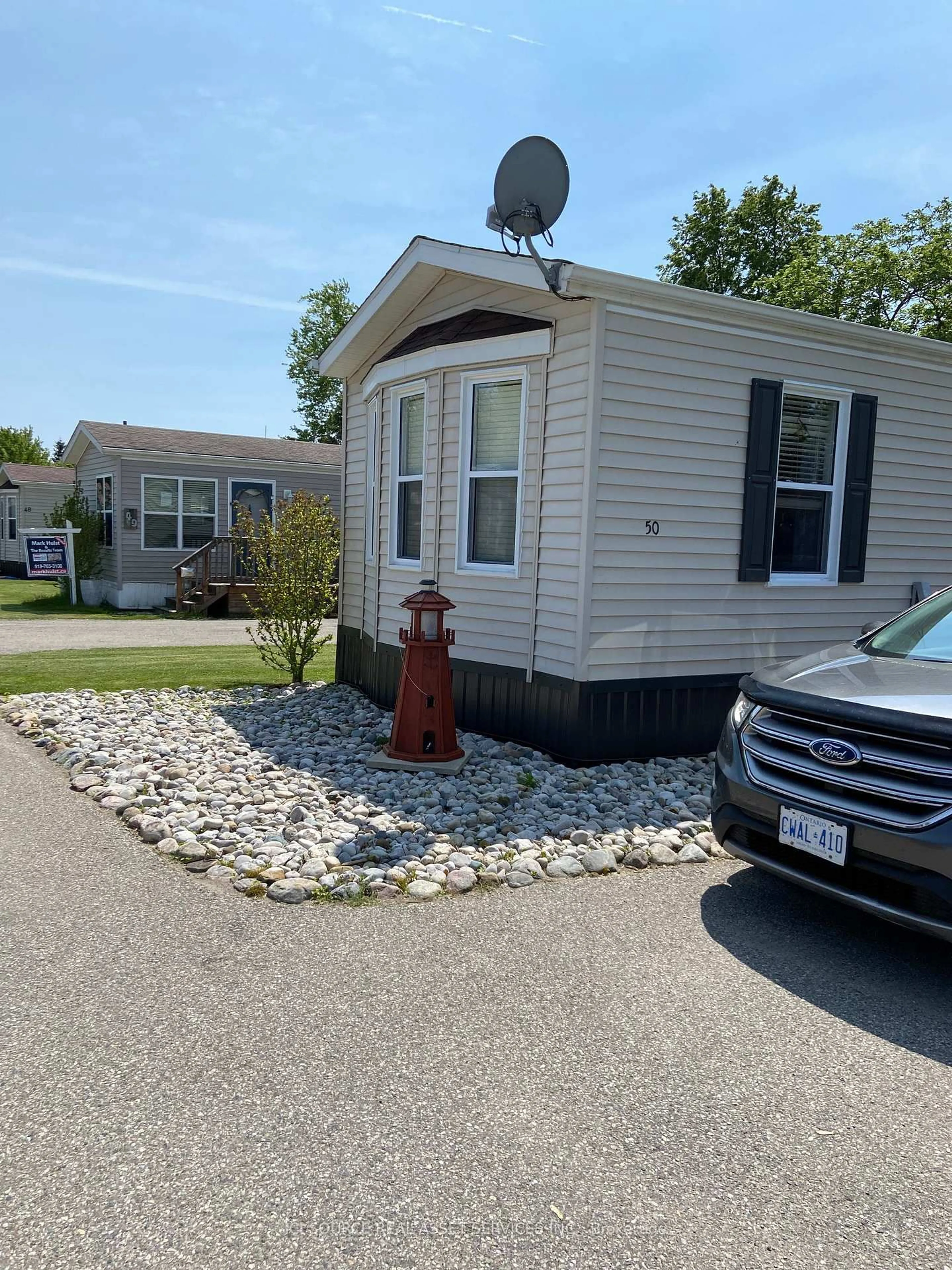 Home with vinyl exterior material, street for 33 Pitt St #50, Bayham Ontario N0J 1T0