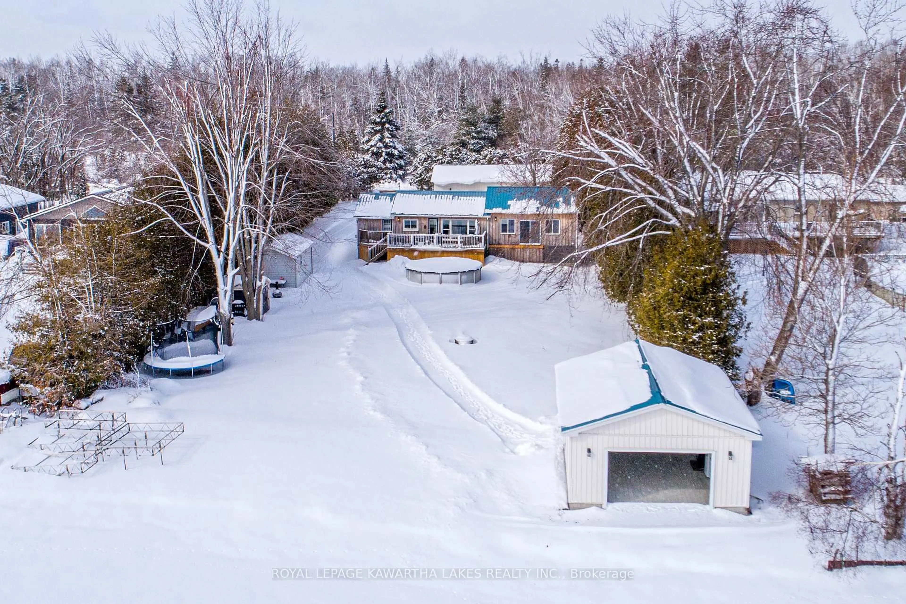A pic from outside/outdoor area/front of a property/back of a property/a pic from drone, unknown for 130 Crawford Rd, Kawartha Lakes Ontario L0K 1B0
