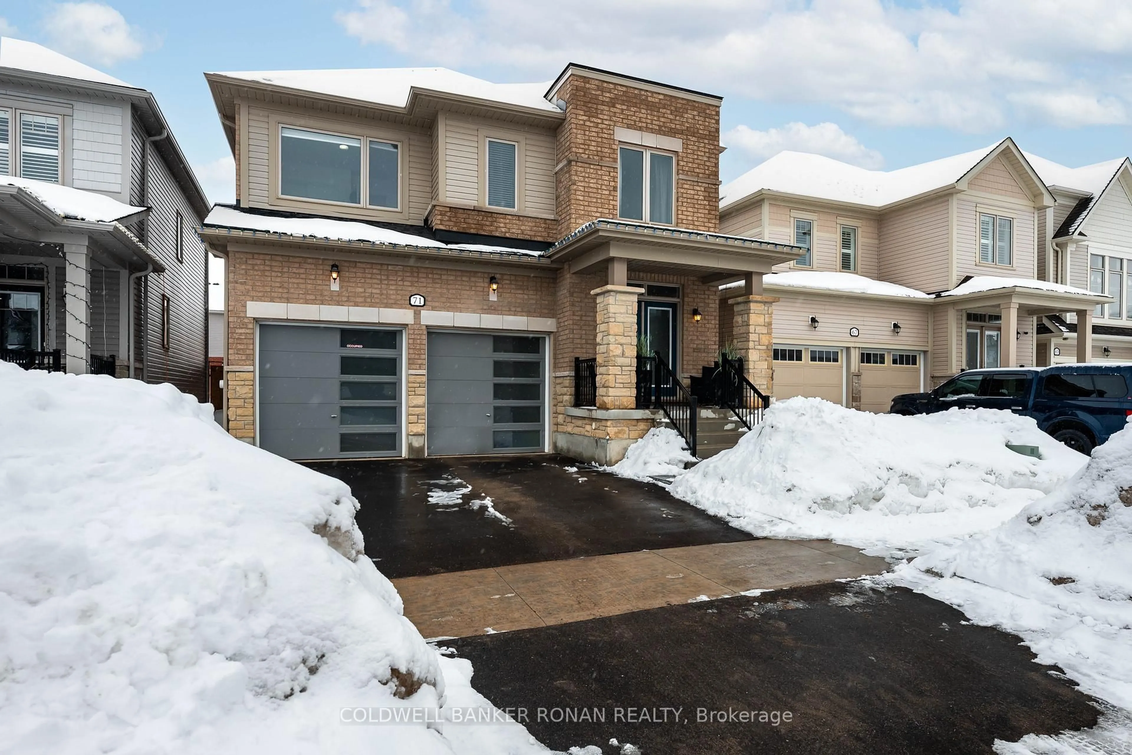 Home with brick exterior material, street for 71 Harpin Way, Centre Wellington Ontario N1M 0H8