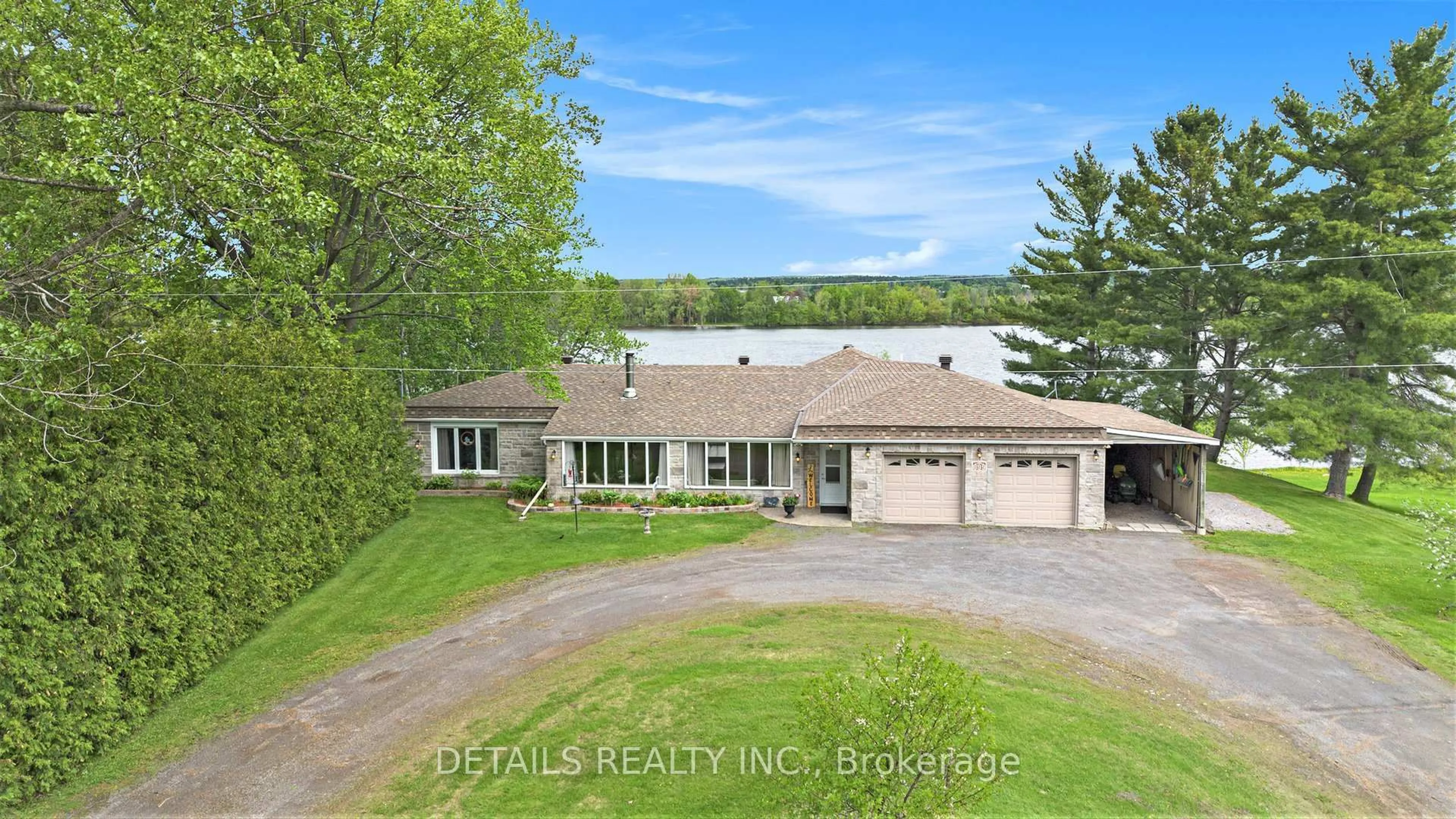 A pic from outside/outdoor area/front of a property/back of a property/a pic from drone, water/lake/river/ocean view for 899 Concession 1 Rd, Alfred and Plantagenet Ontario K0B 1L0