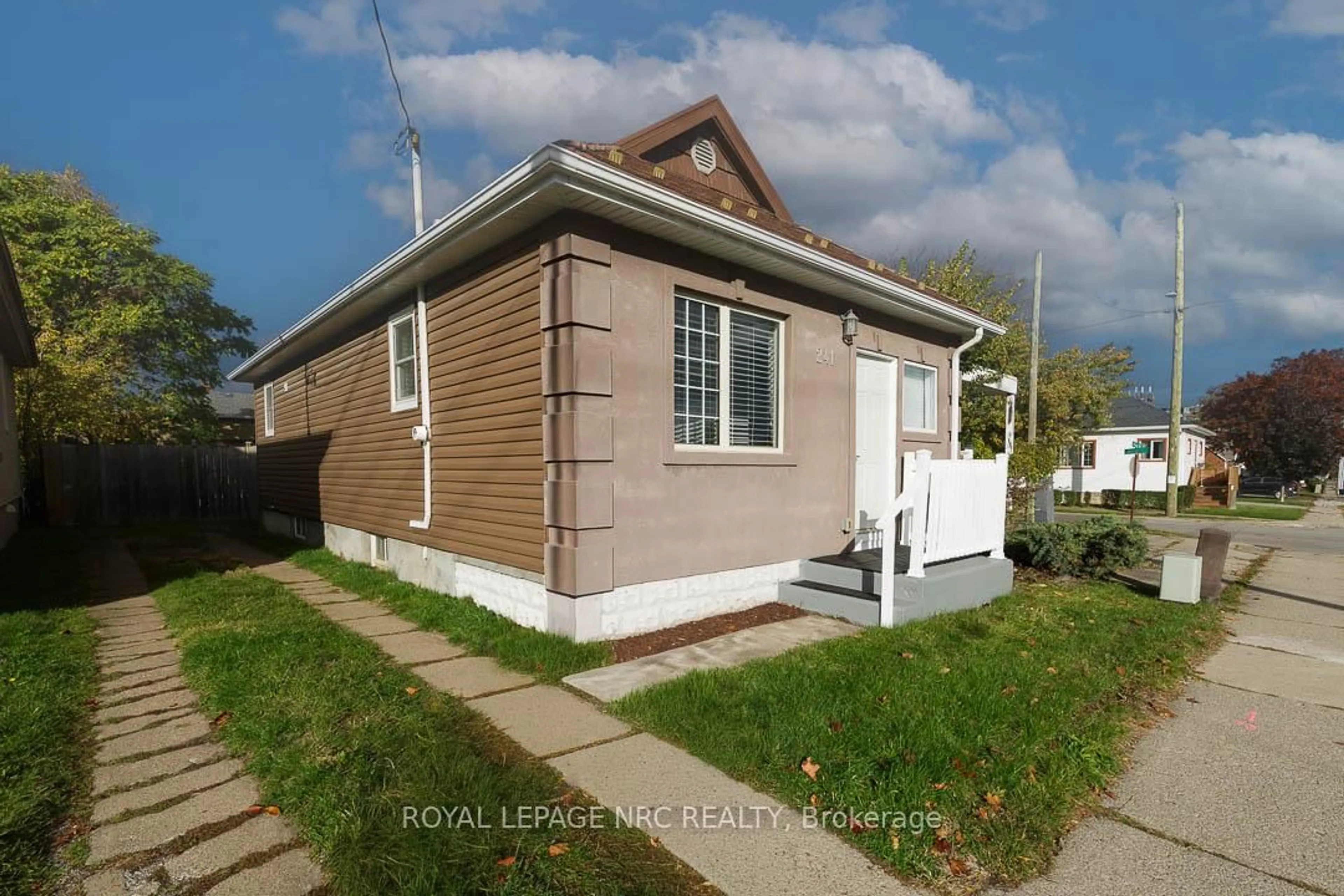 Home with vinyl exterior material, street for 241 Vine St, St. Catharines Ontario L2M 4S9