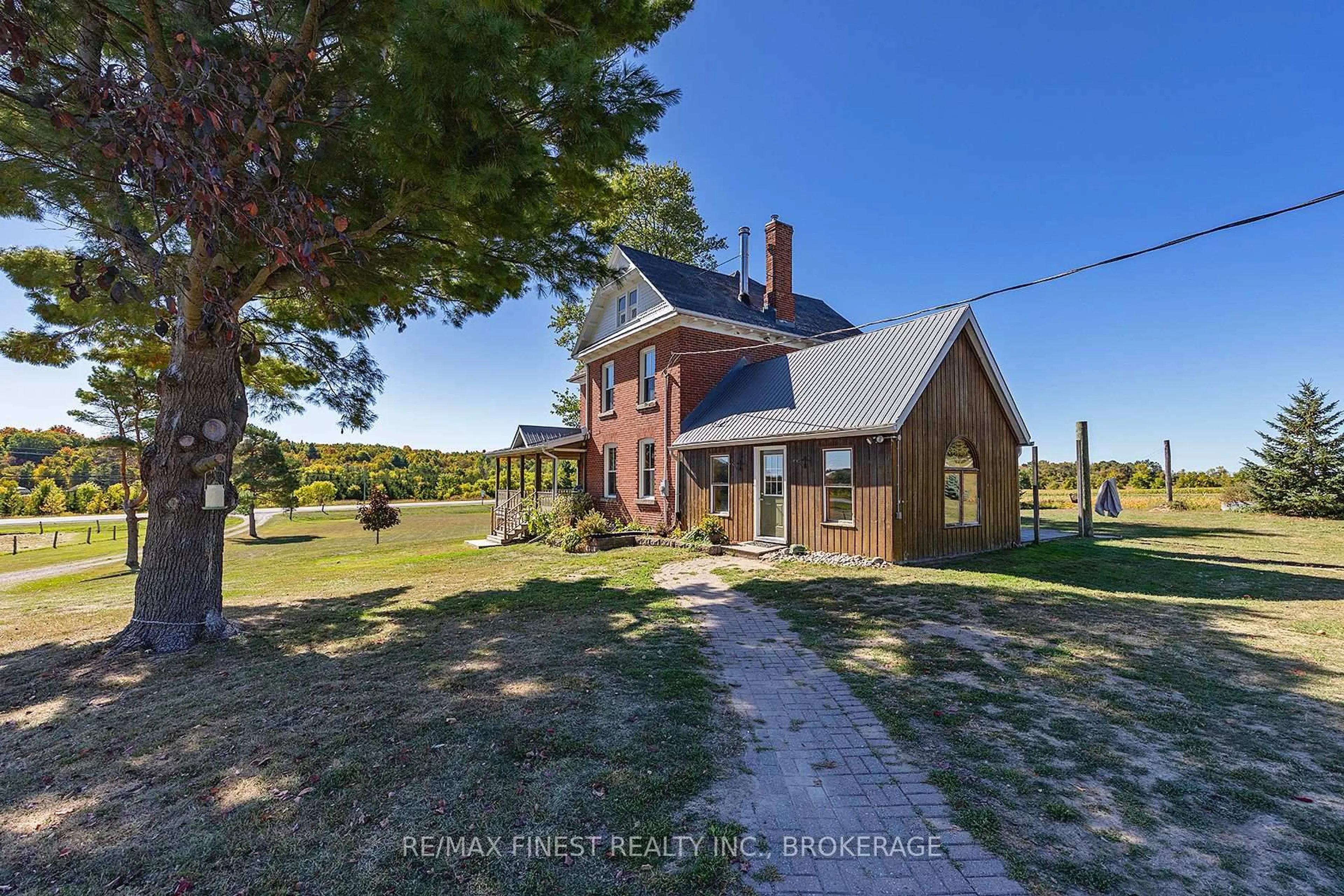 A pic from outside/outdoor area/front of a property/back of a property/a pic from drone, unknown for 6676 Highway 15, Seeley's Bay Ontario K0H 2N0