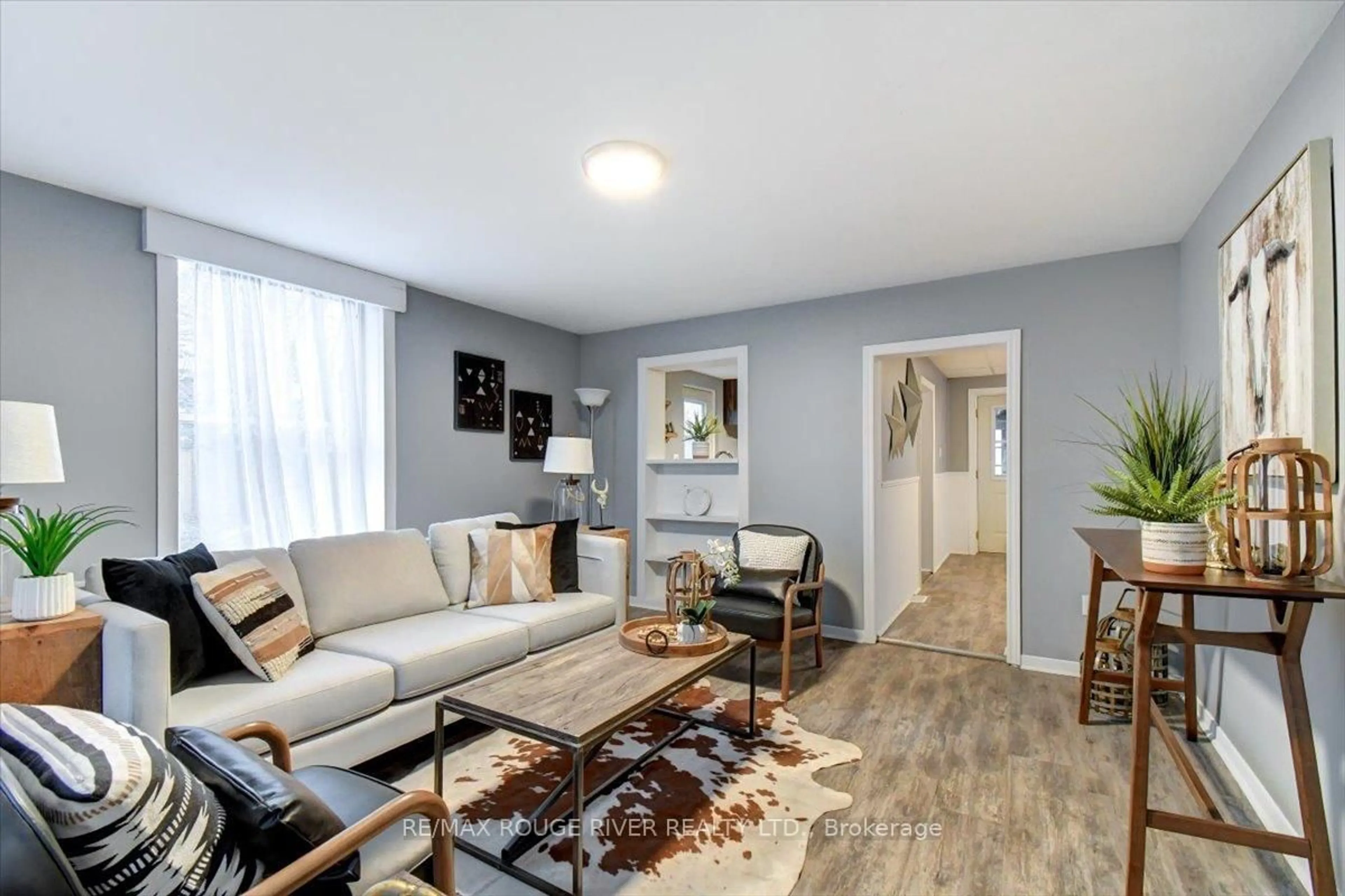 Living room with furniture, wood/laminate floor for 226 Old Danforth Rd, Alnwick/Haldimand Ontario K0K 2G0