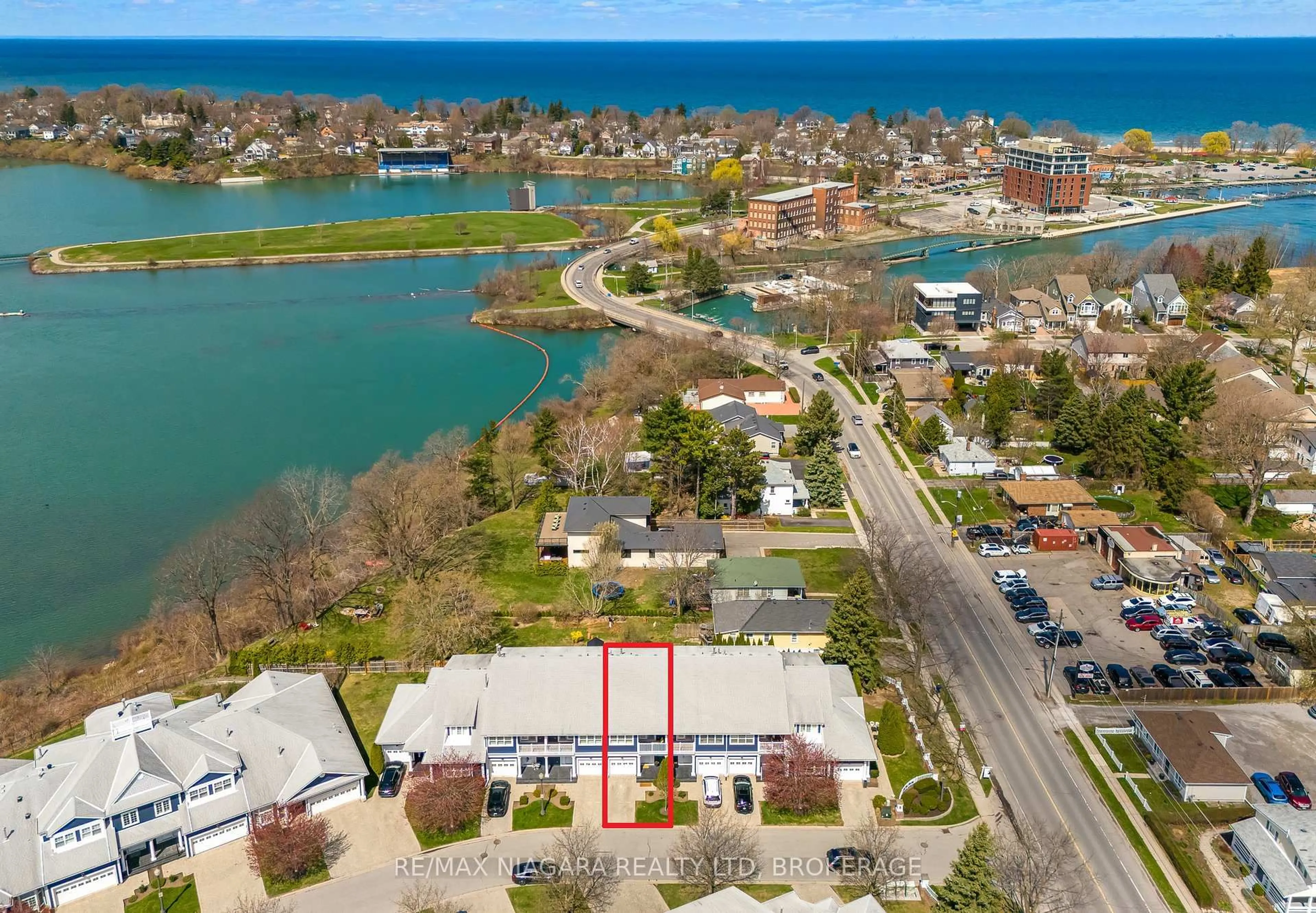 A pic from outside/outdoor area/front of a property/back of a property/a pic from drone, water/lake/river/ocean view for 88 Lakeport Rd #4, St. Catharines Ontario L2N 4P8