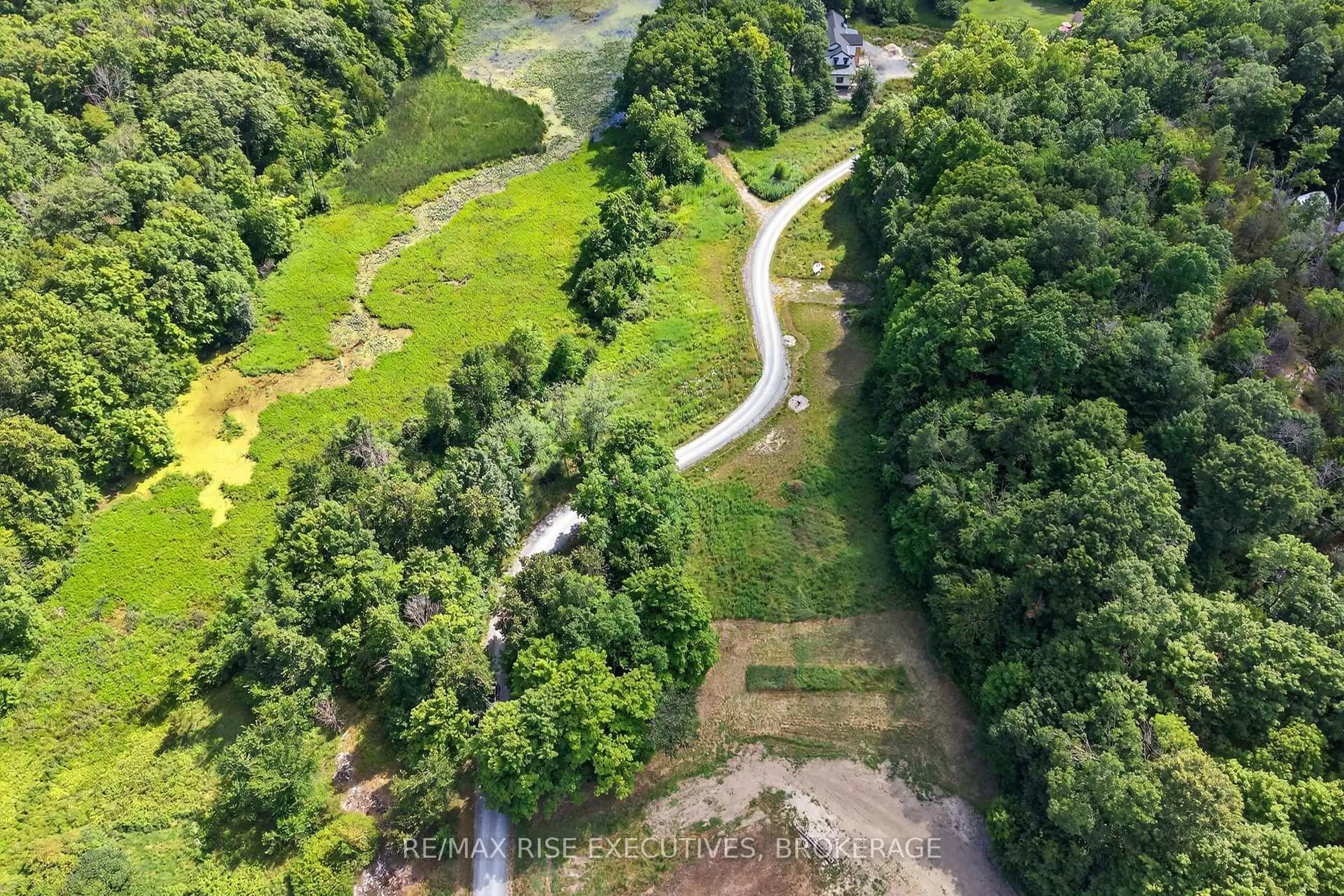 A pic from outside/outdoor area/front of a property/back of a property/a pic from drone, forest/trees view for 7 Cranberry Cove Lane, Seeley's Bay Ontario K0H 2N0