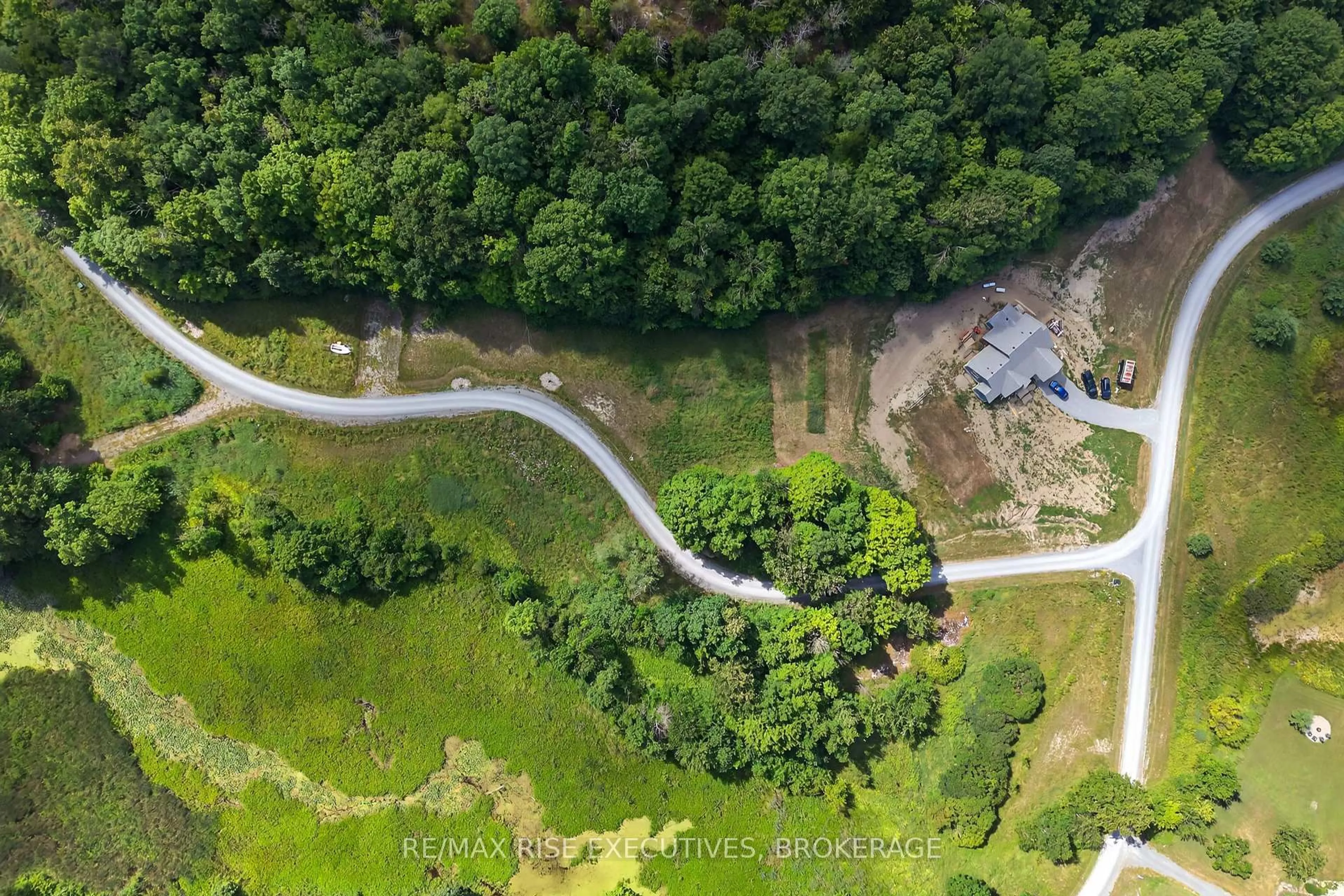 A pic from outside/outdoor area/front of a property/back of a property/a pic from drone, forest/trees view for 7 Cranberry Cove Lane, Seeley's Bay Ontario K0H 2N0