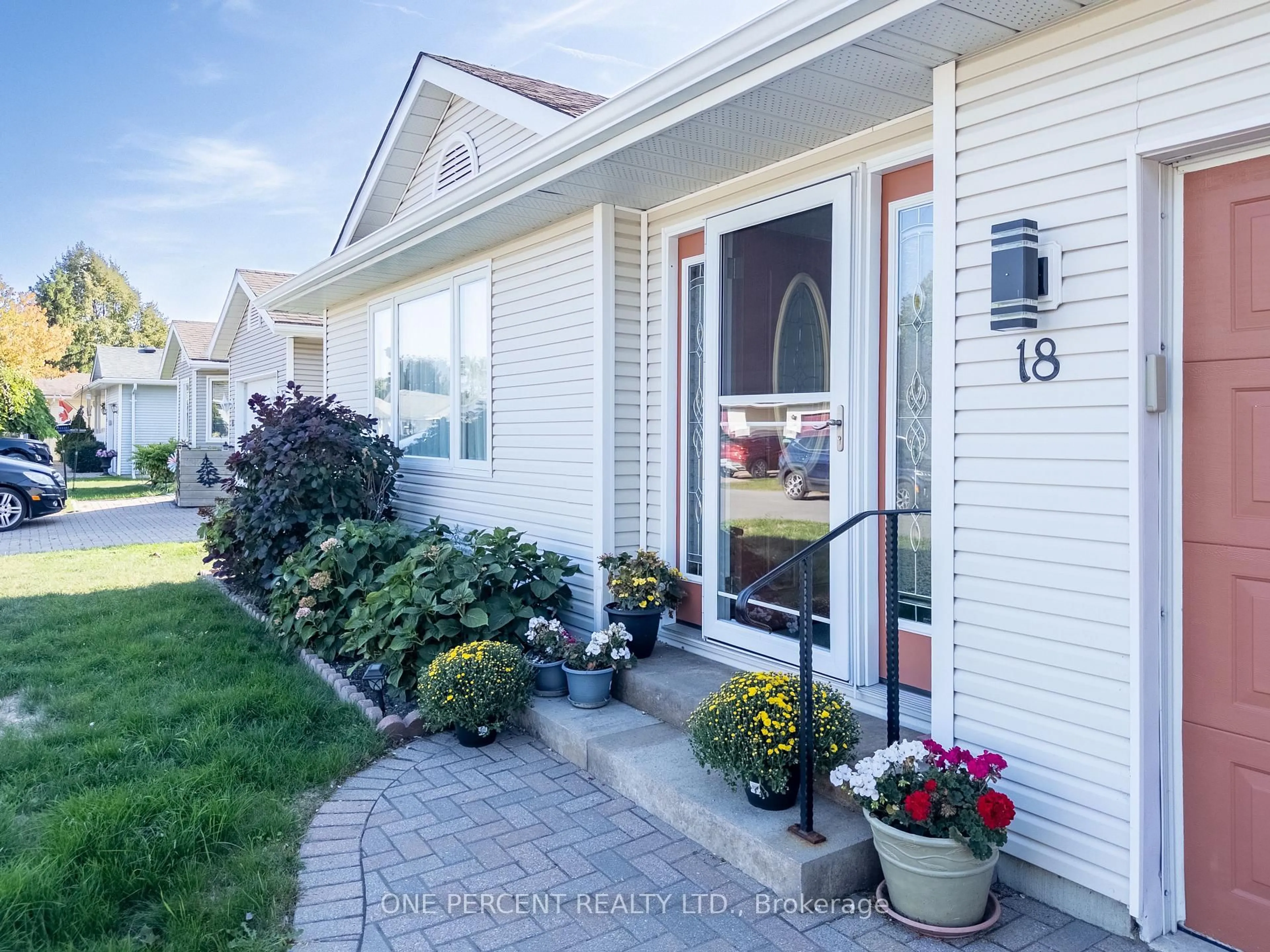 Home with vinyl exterior material, street for 18 MONROE Crt, Prince Edward County Ontario K0K 3L0