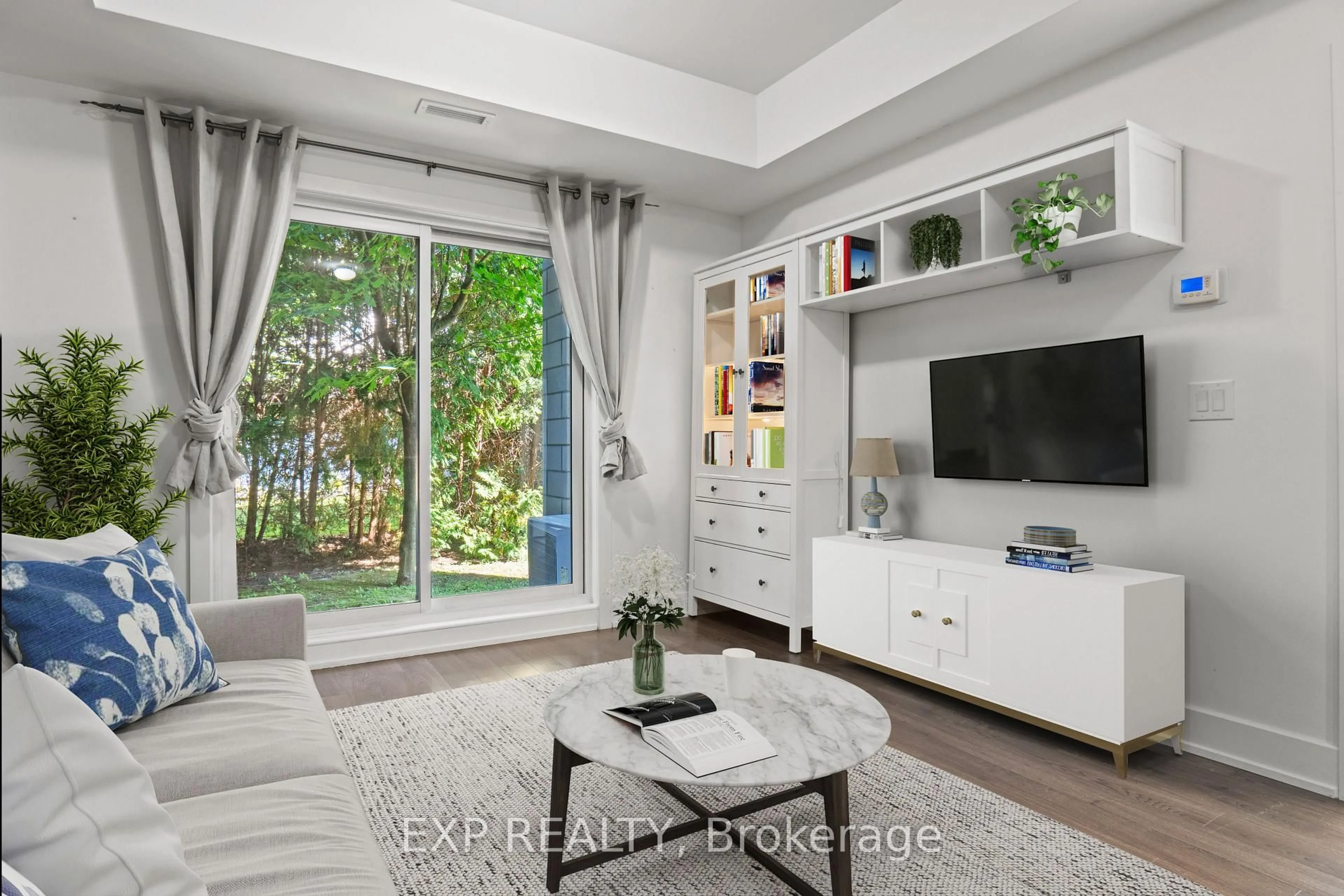 Living room with furniture, unknown for 2785 Baseline Rd #108, Ottawa Ontario K2H 0B7