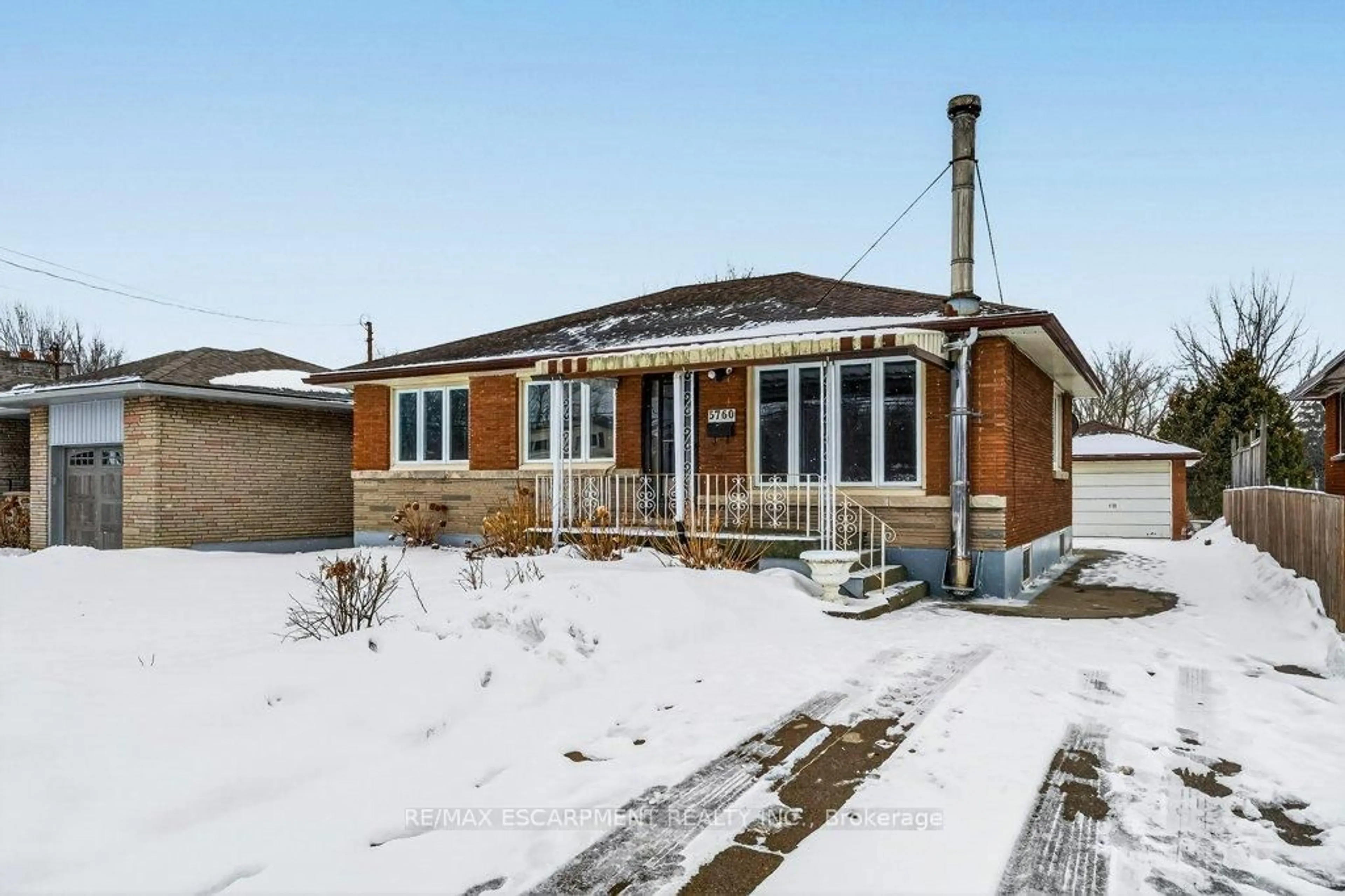 Home with brick exterior material, street for 5760 Church's Lane, Niagara Falls Ontario L2J 1Y7