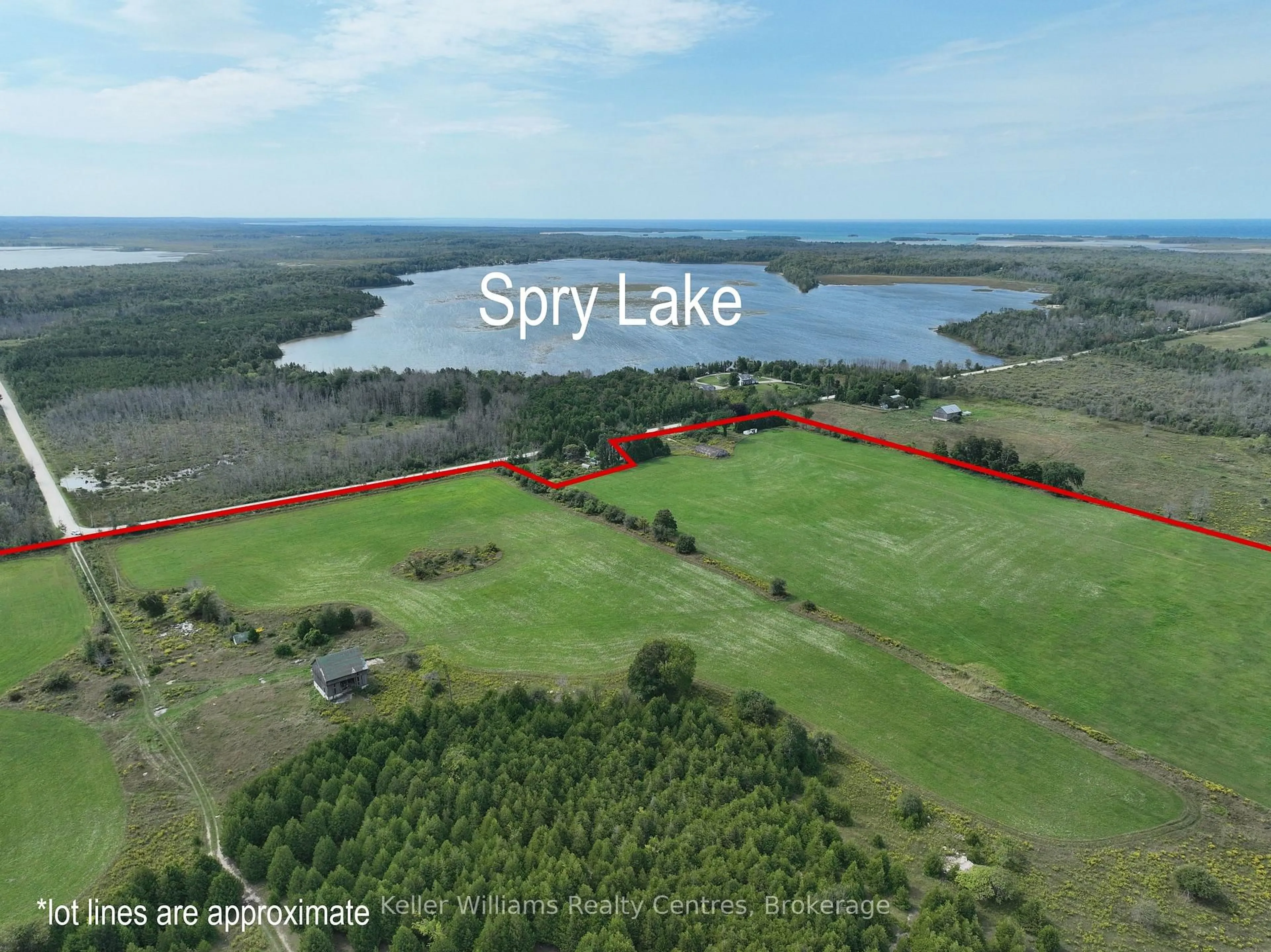 A pic from outside/outdoor area/front of a property/back of a property/a pic from drone, water/lake/river/ocean view for 387 SPRY LAKE Rd, South Bruce Peninsula Ontario N0H 2T0