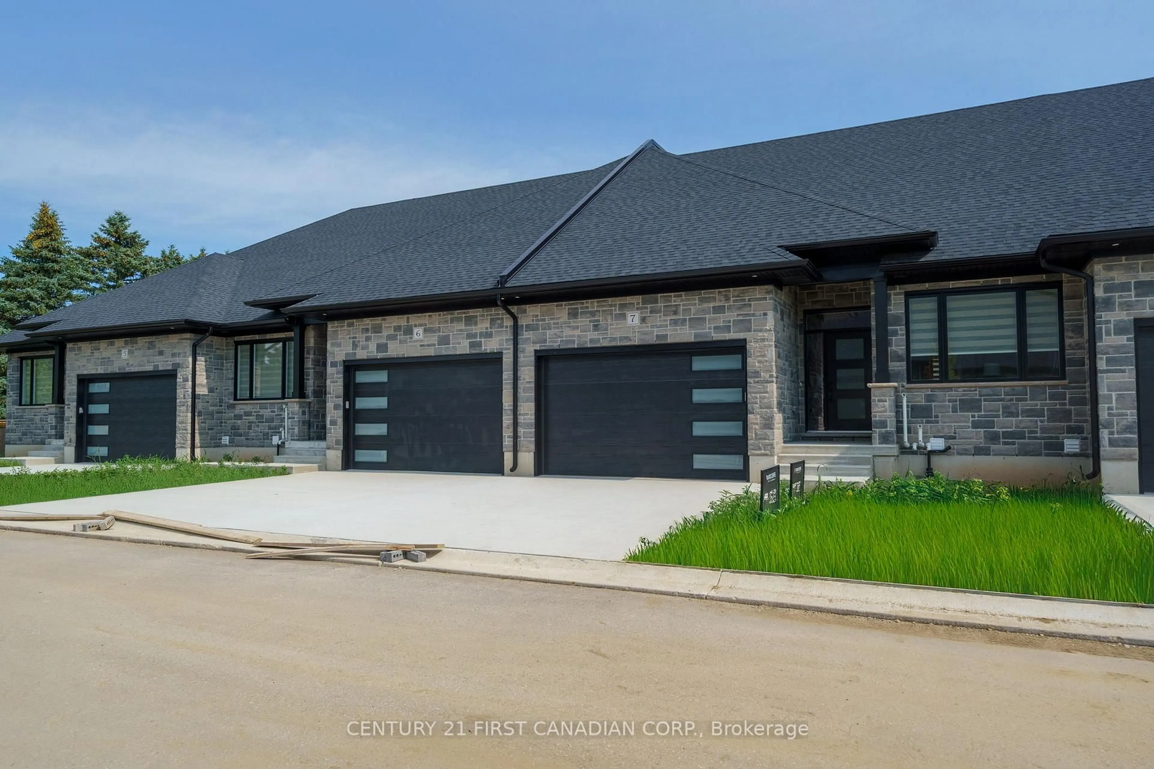 Home with brick exterior material, street for 32 Postma St #6, North Middlesex Ontario N0M 1A0