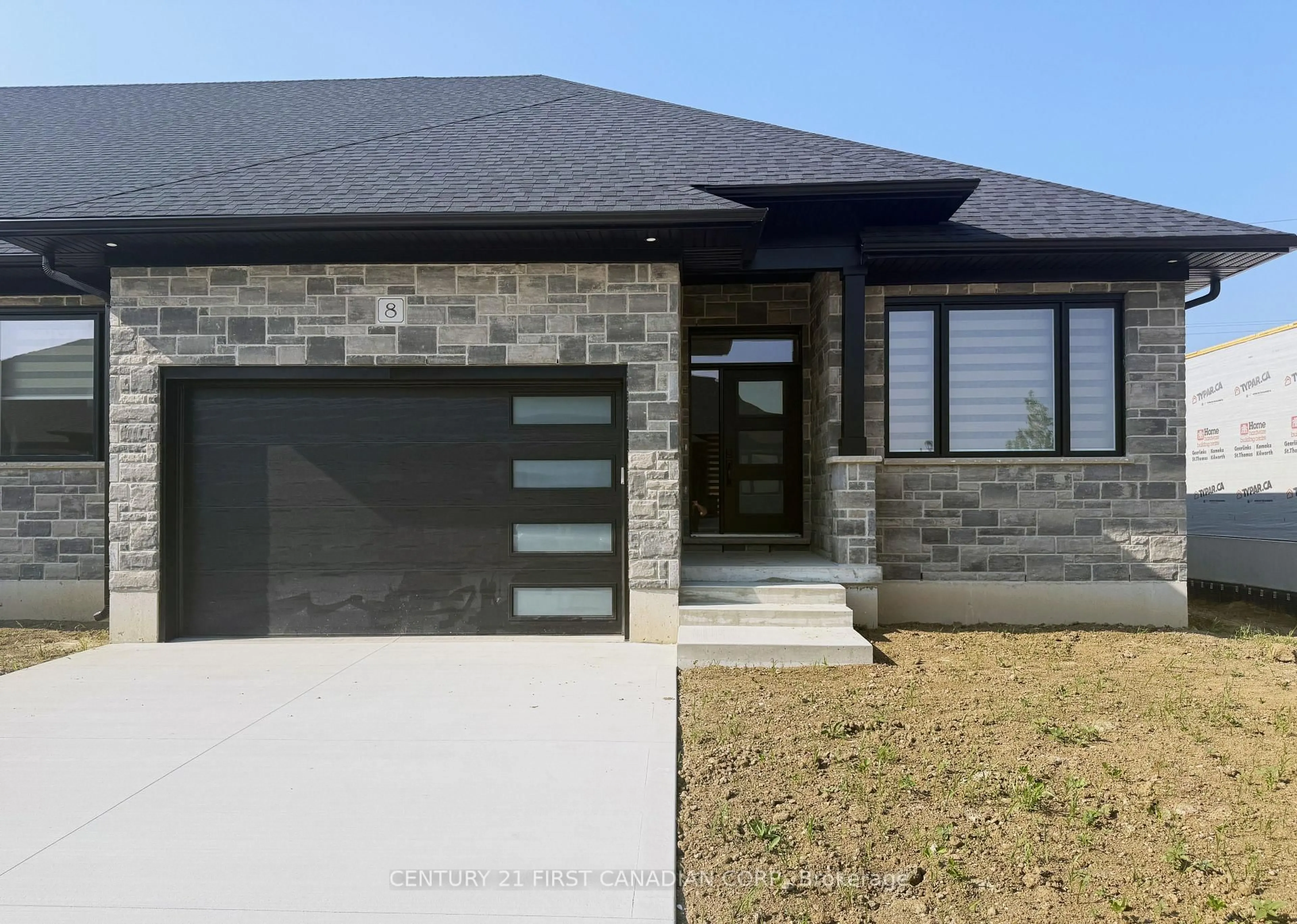 Home with brick exterior material, street for 32 Postma Cres #8, North Middlesex Ontario N0M 1A0