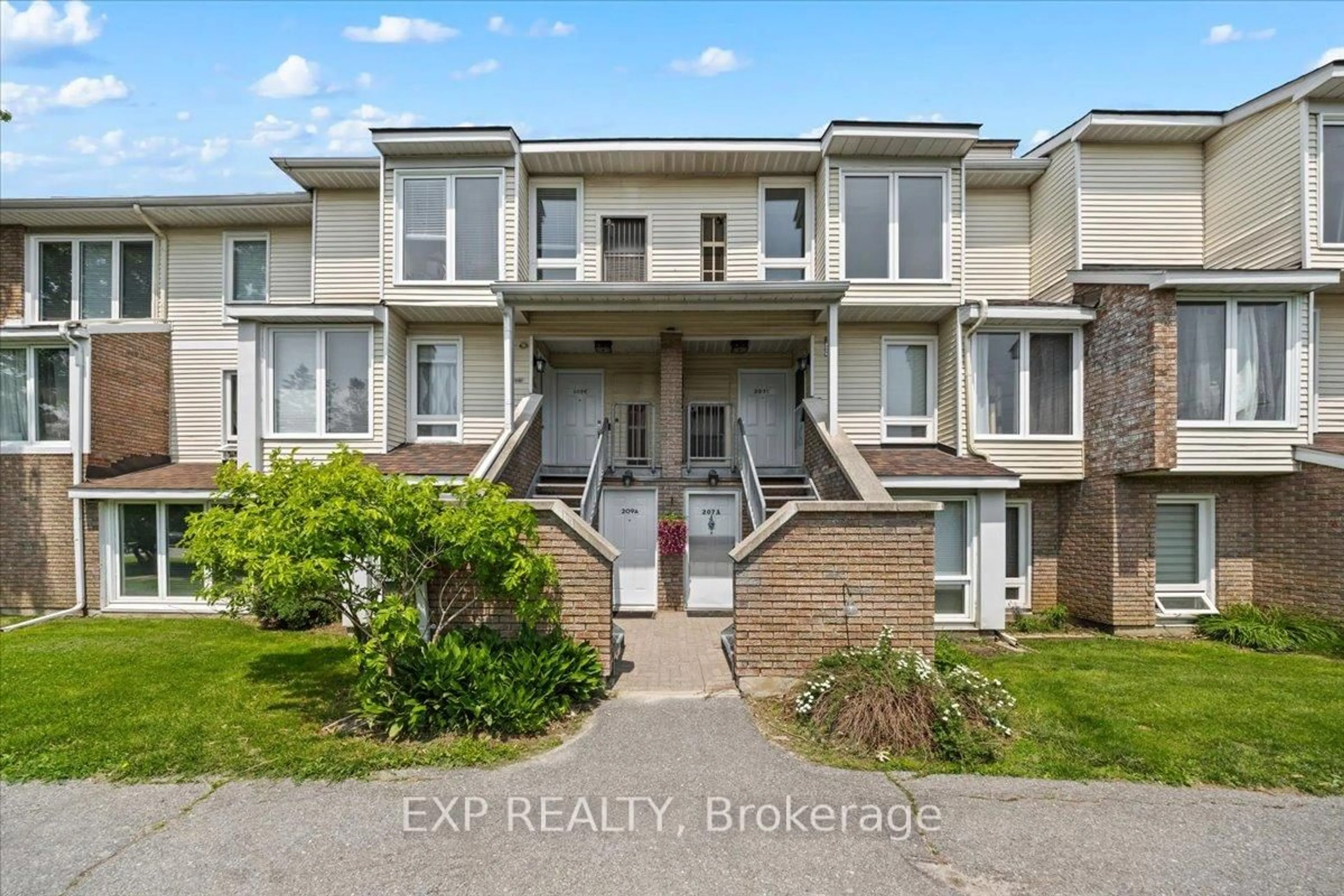 A pic from outside/outdoor area/front of a property/back of a property/a pic from drone, unknown for 207 Woodfield Dr #B, Ottawa Ontario K2G 4P2