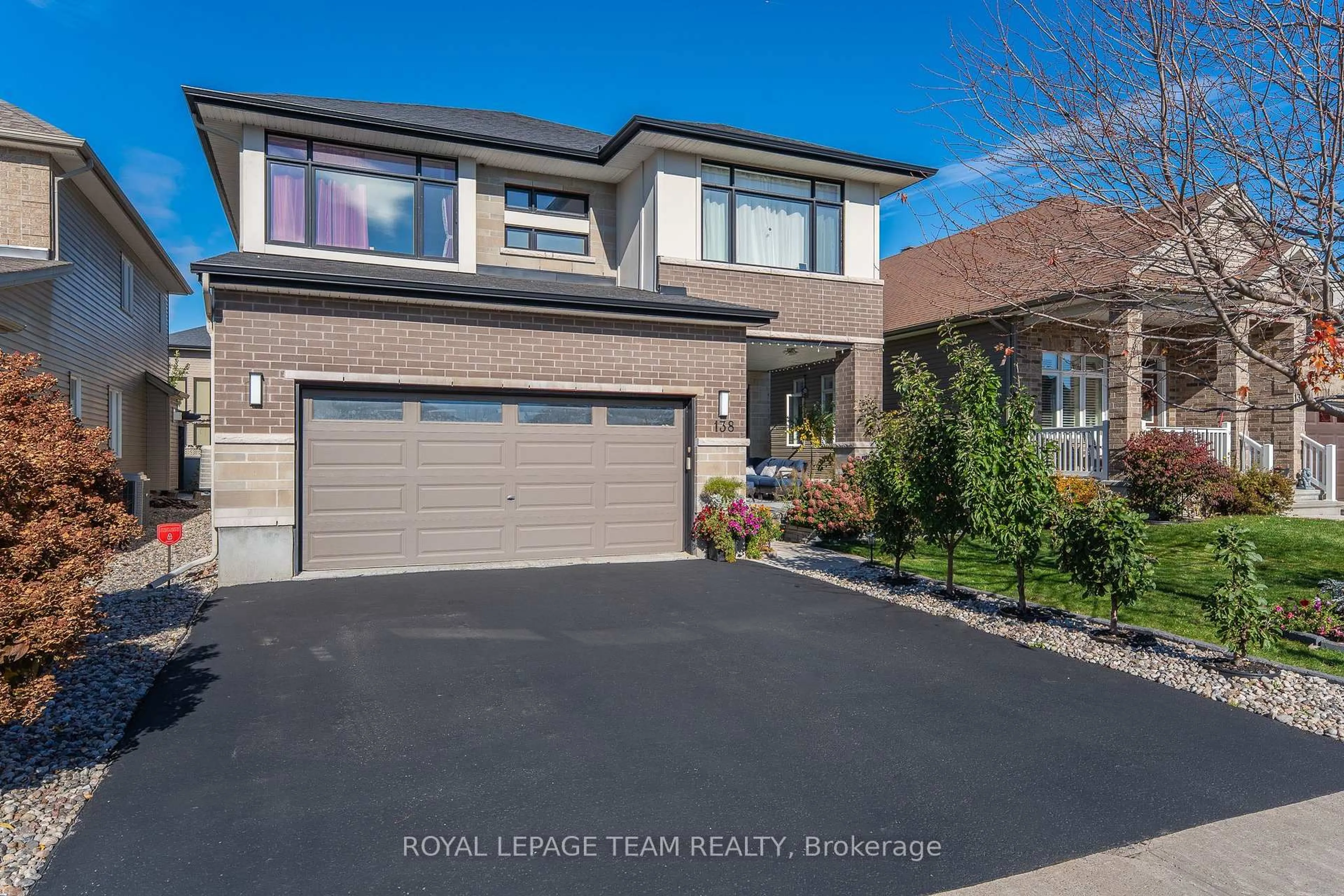 Home with brick exterior material, street for 138 Stonemeadow Dr, Ottawa Ontario K2M 0G9