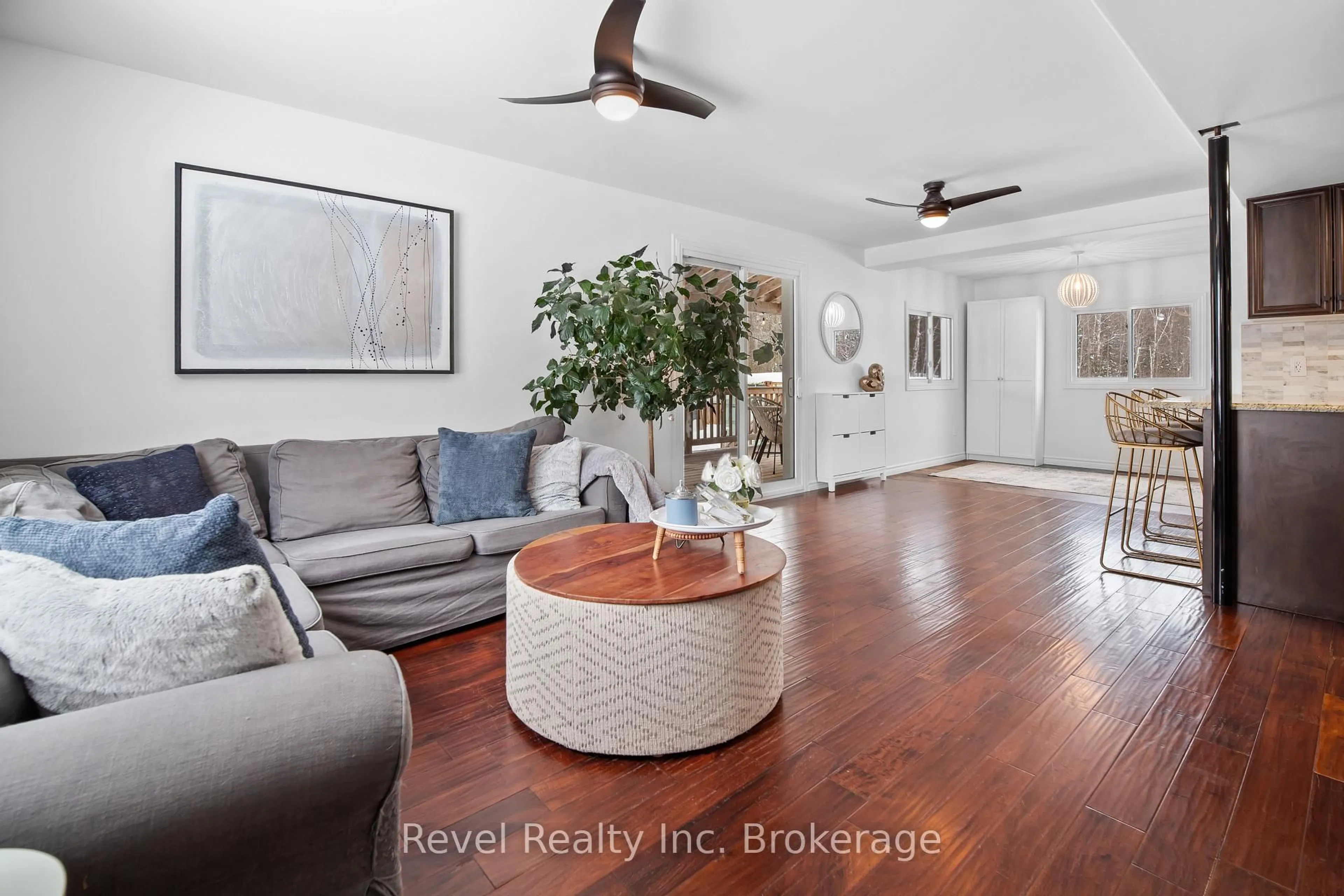 Living room with furniture, ceramic/tile floor for 687 Oakwood Rd, Powassan Ontario P0H 1Z0