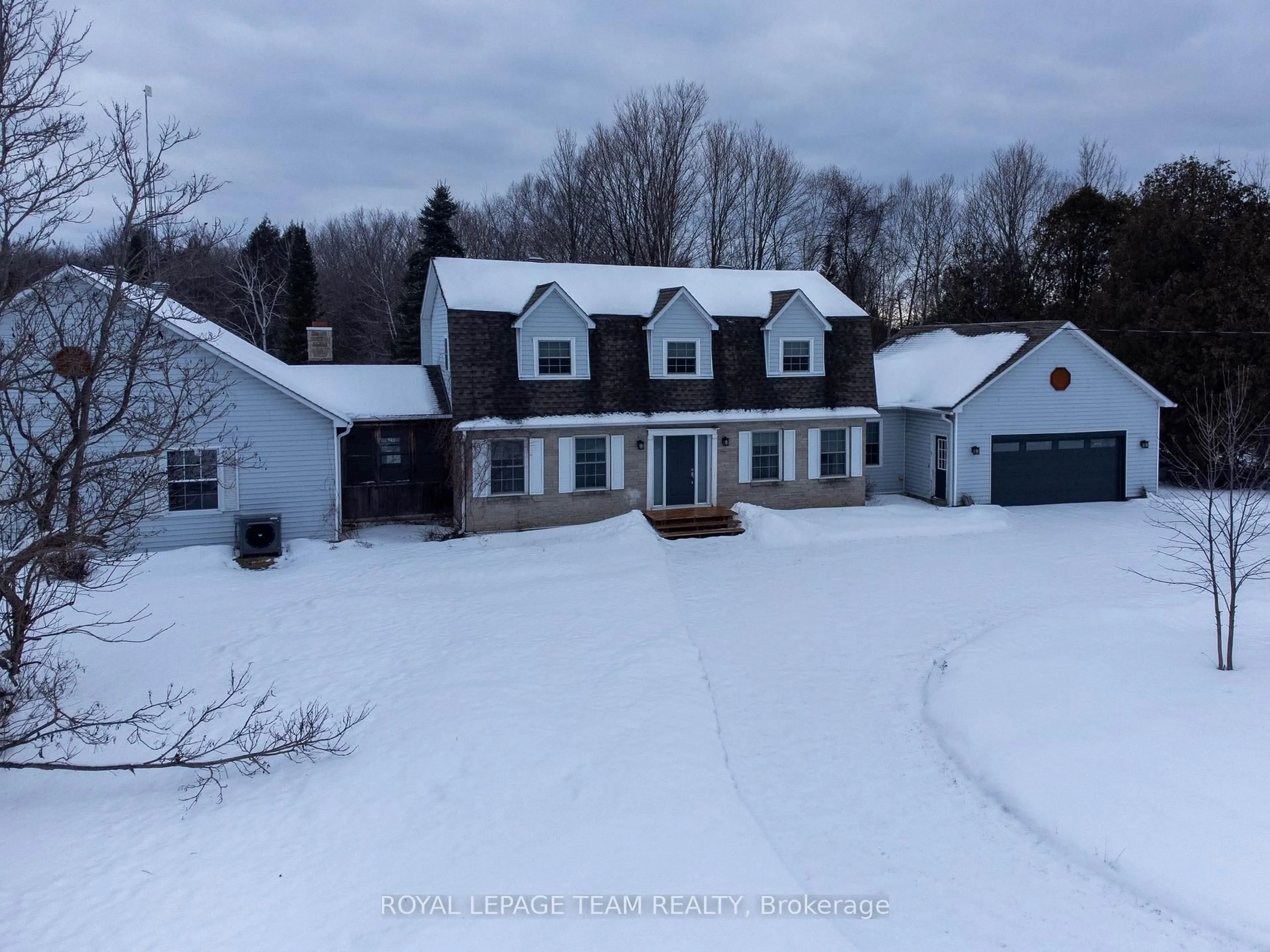 A pic from outside/outdoor area/front of a property/back of a property/a pic from drone, unknown for 910 Bolton Rd, North Grenville Ontario K0G 1N0