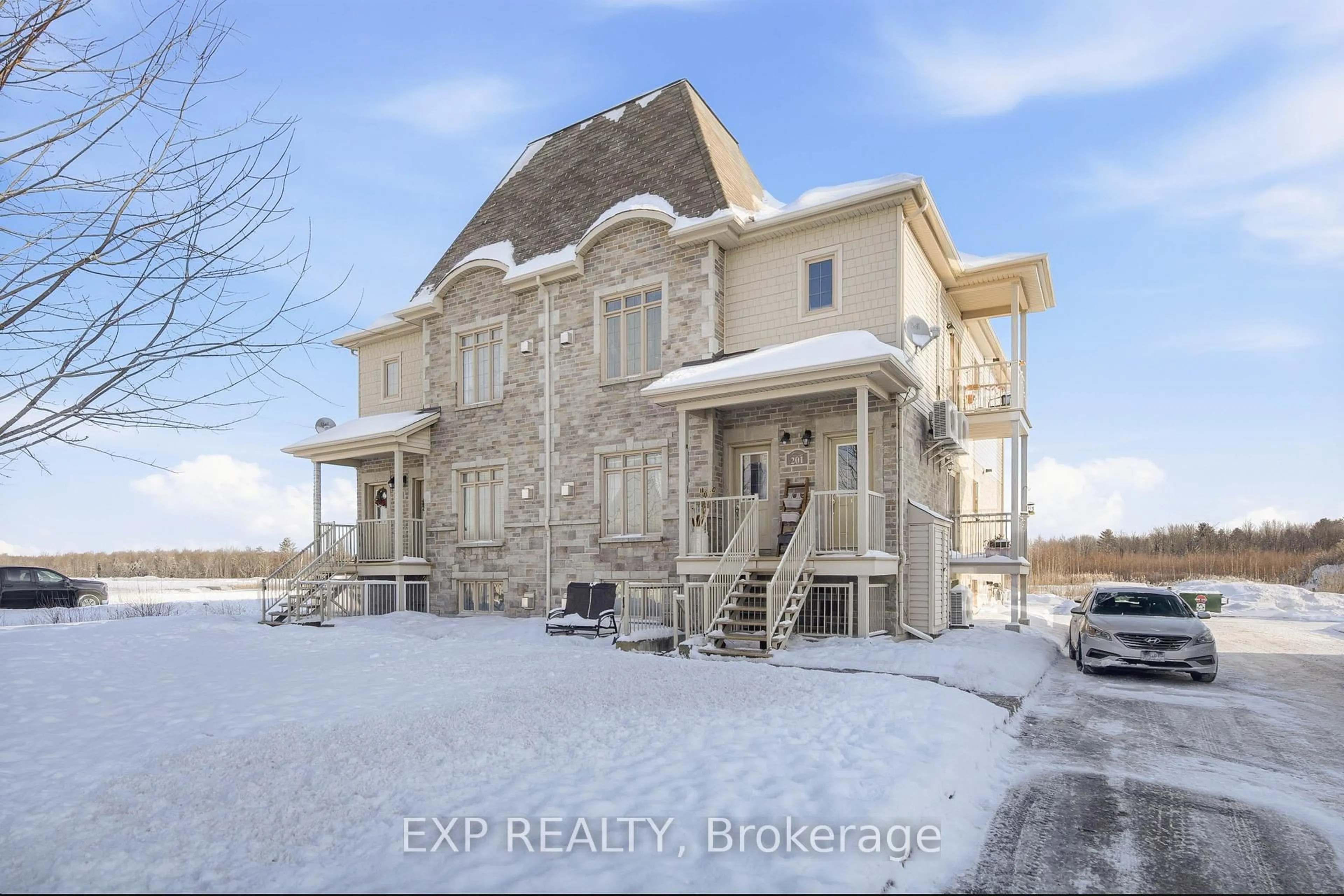 A pic from outside/outdoor area/front of a property/back of a property/a pic from drone, building for 201 Bourdeau Blvd #1, The Nation Ontario K0A 2M0