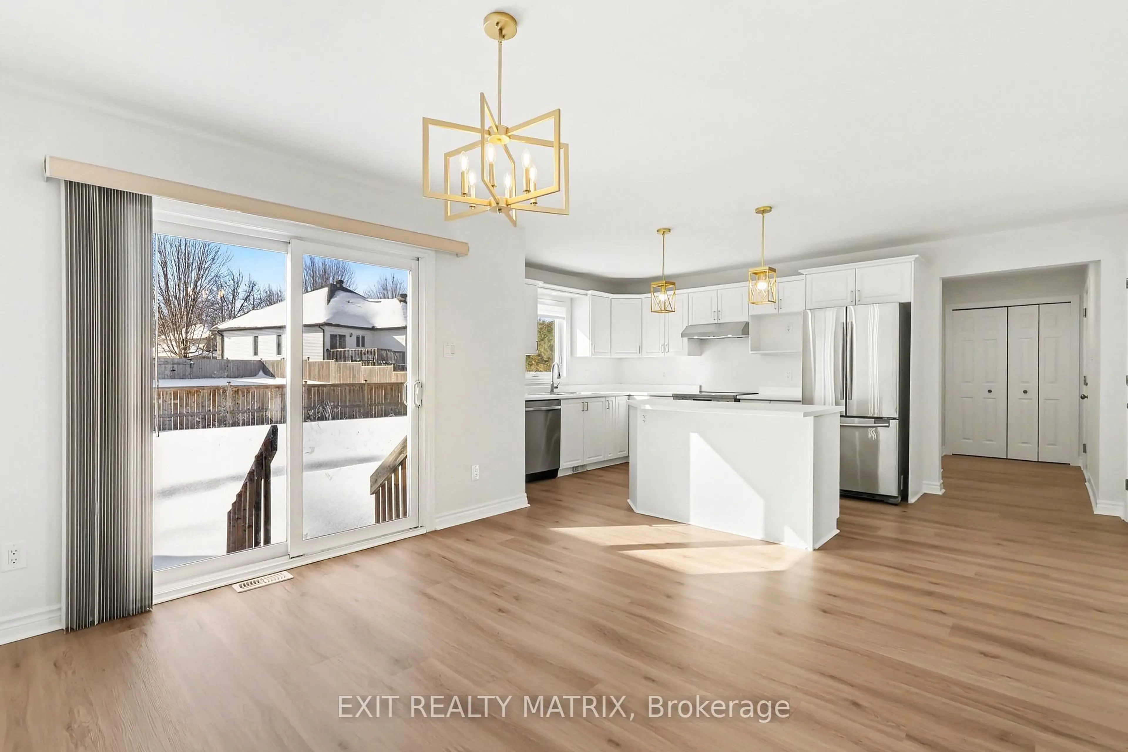 Open concept kitchen, wood/laminate floor for 28 Honore Cres, The Nation Ontario K0A 2M0