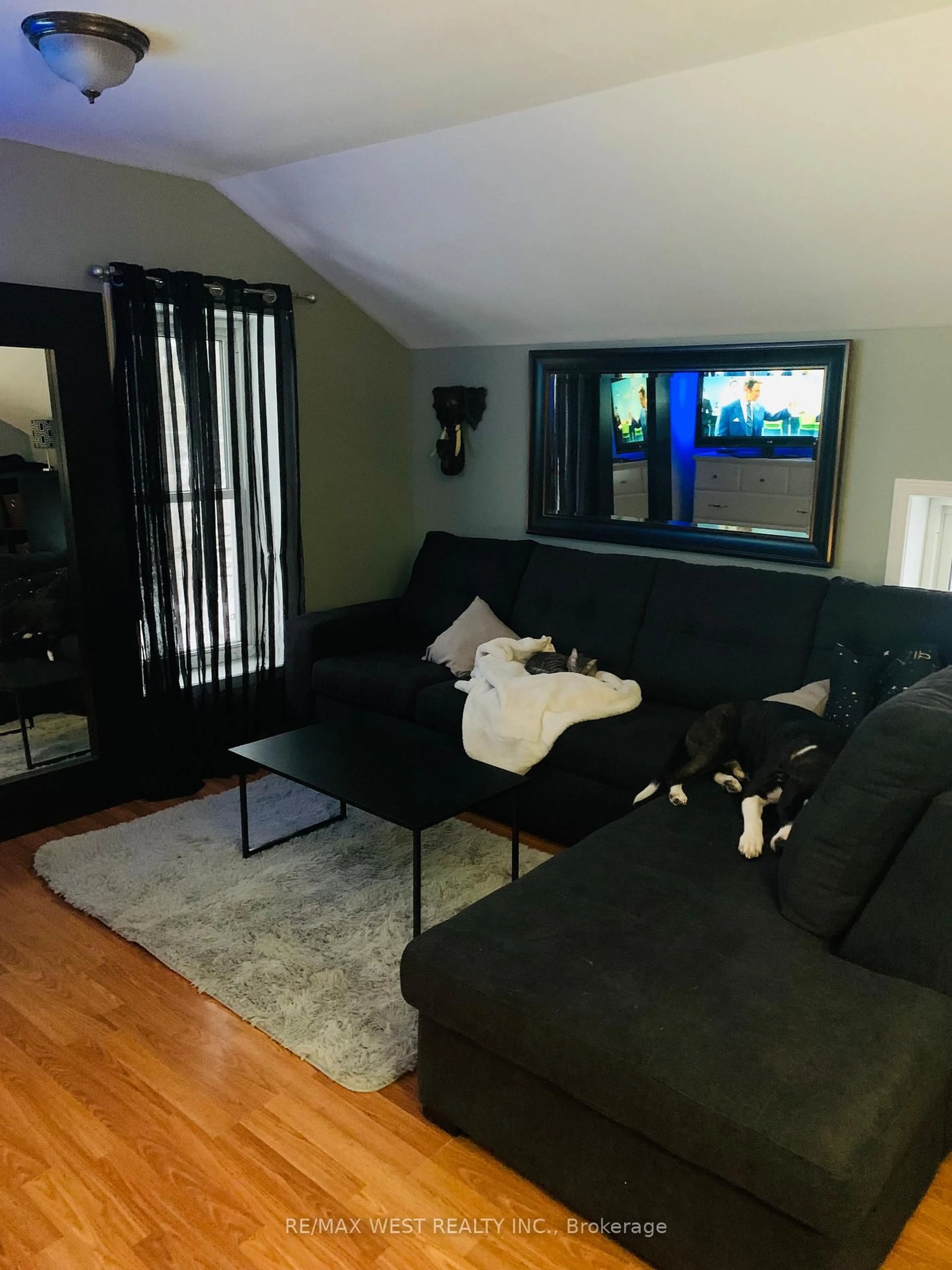 Living room with furniture, wood/laminate floor for 182 12th St, Hanover Ontario N4N 1T8