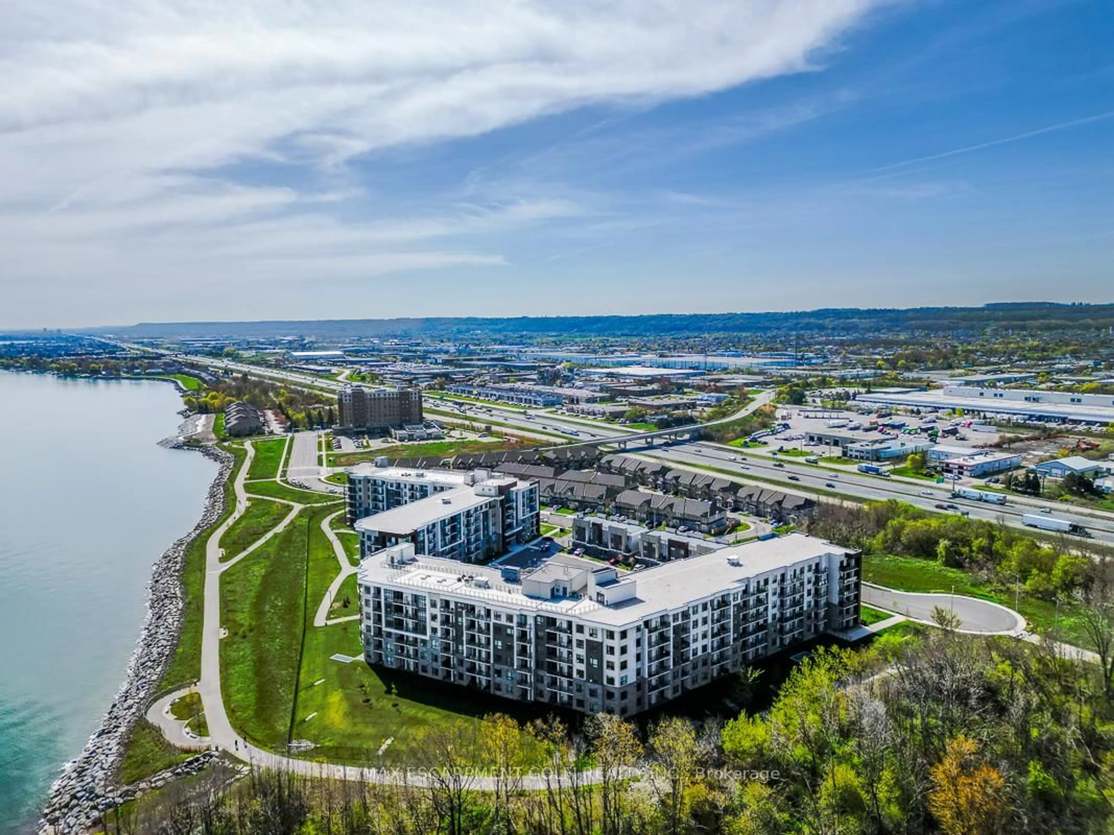 A pic from outside/outdoor area/front of a property/back of a property/a pic from drone, water/lake/river/ocean view for 125 Shoreview Pl #102, Hamilton Ontario L8E 0K3