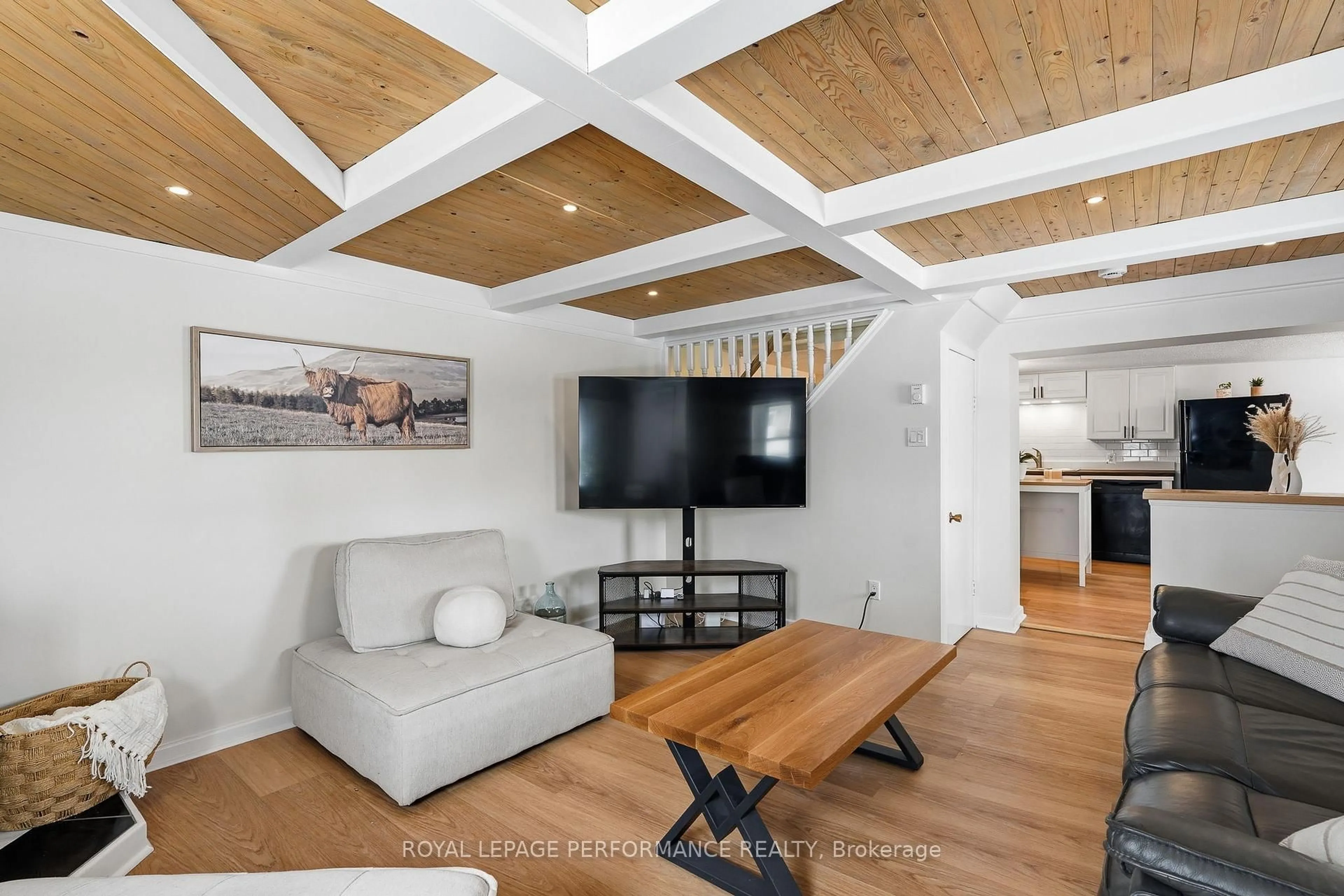 Living room with furniture, wood/laminate floor for 1292 St Jacques Rd, Russell Ontario K0A 1W0