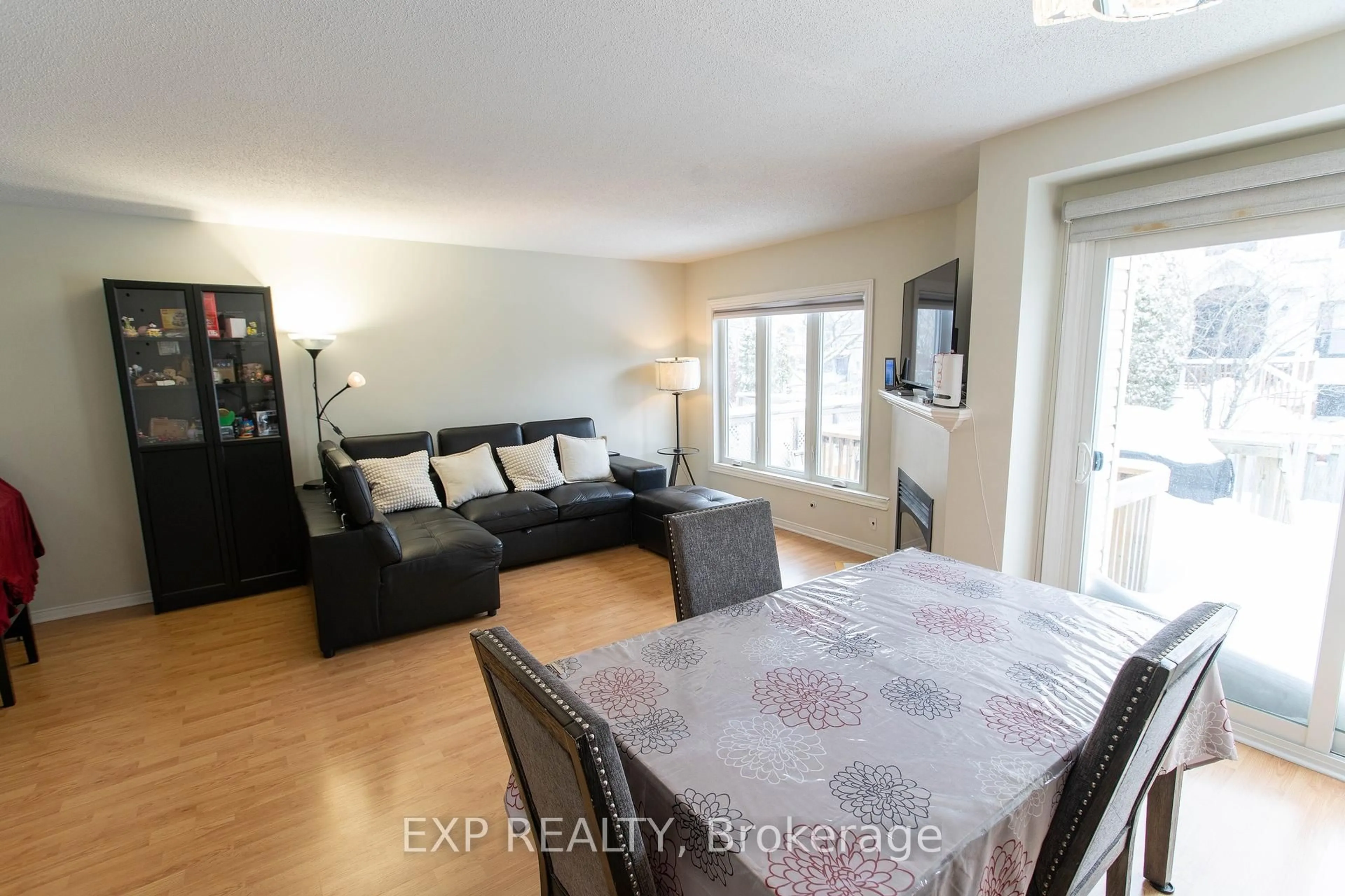 Living room with furniture, wood/laminate floor for 54 Sheppard's Glen Ave, Ottawa Ontario K2M 2M9