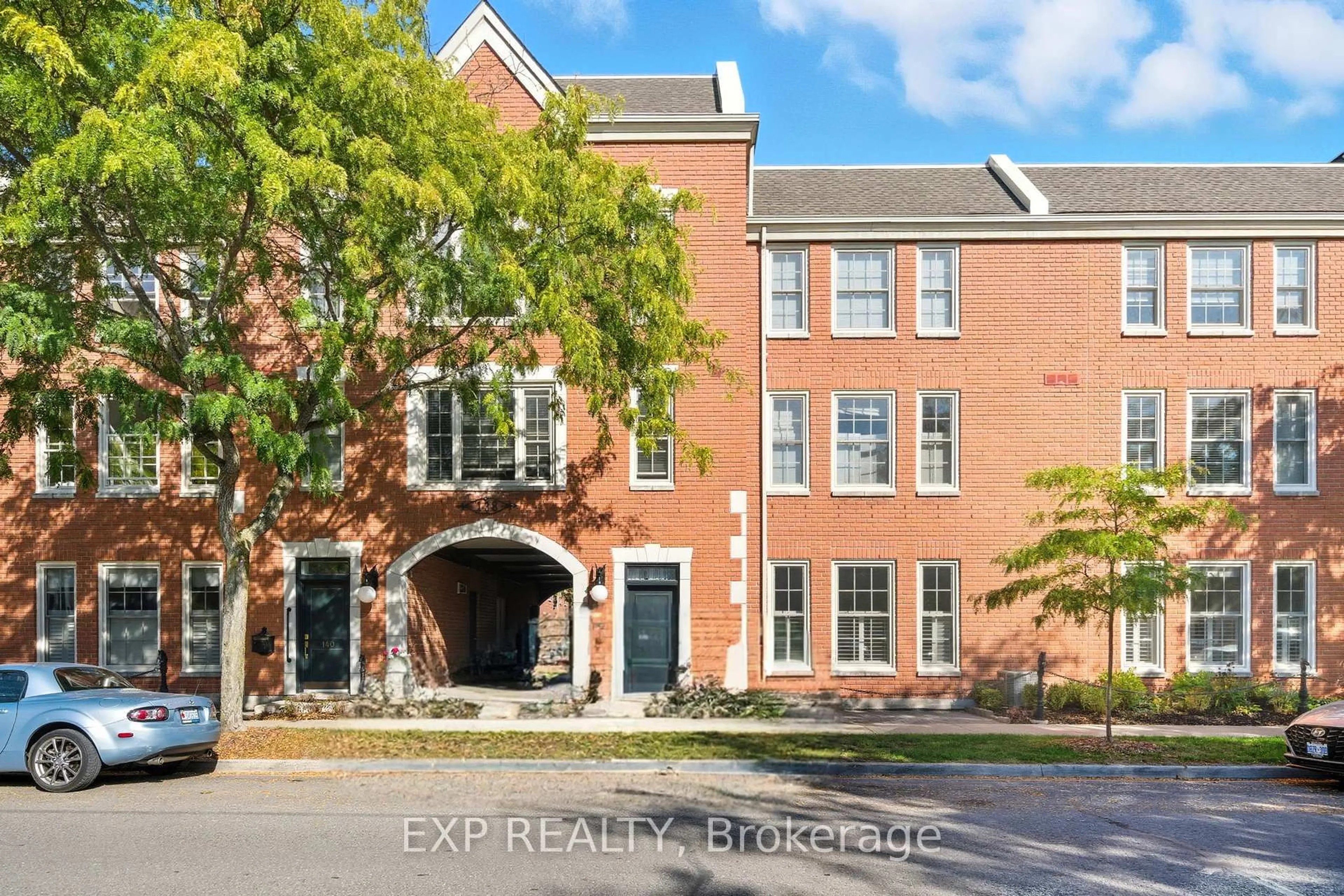 Home with brick exterior material, street for 136 Hibernia St #102, Cobourg Ontario K9A 3J8