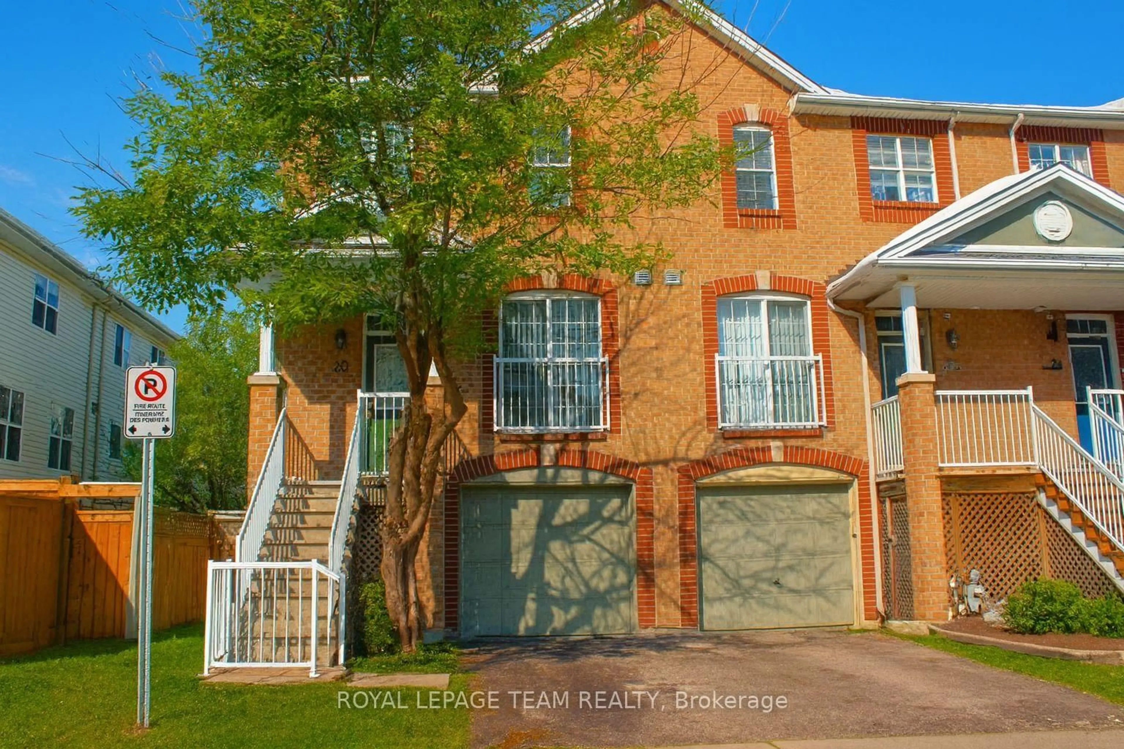 Home with brick exterior material, street for 20 Heartleaf Private, Ottawa Ontario K1T 3Z9