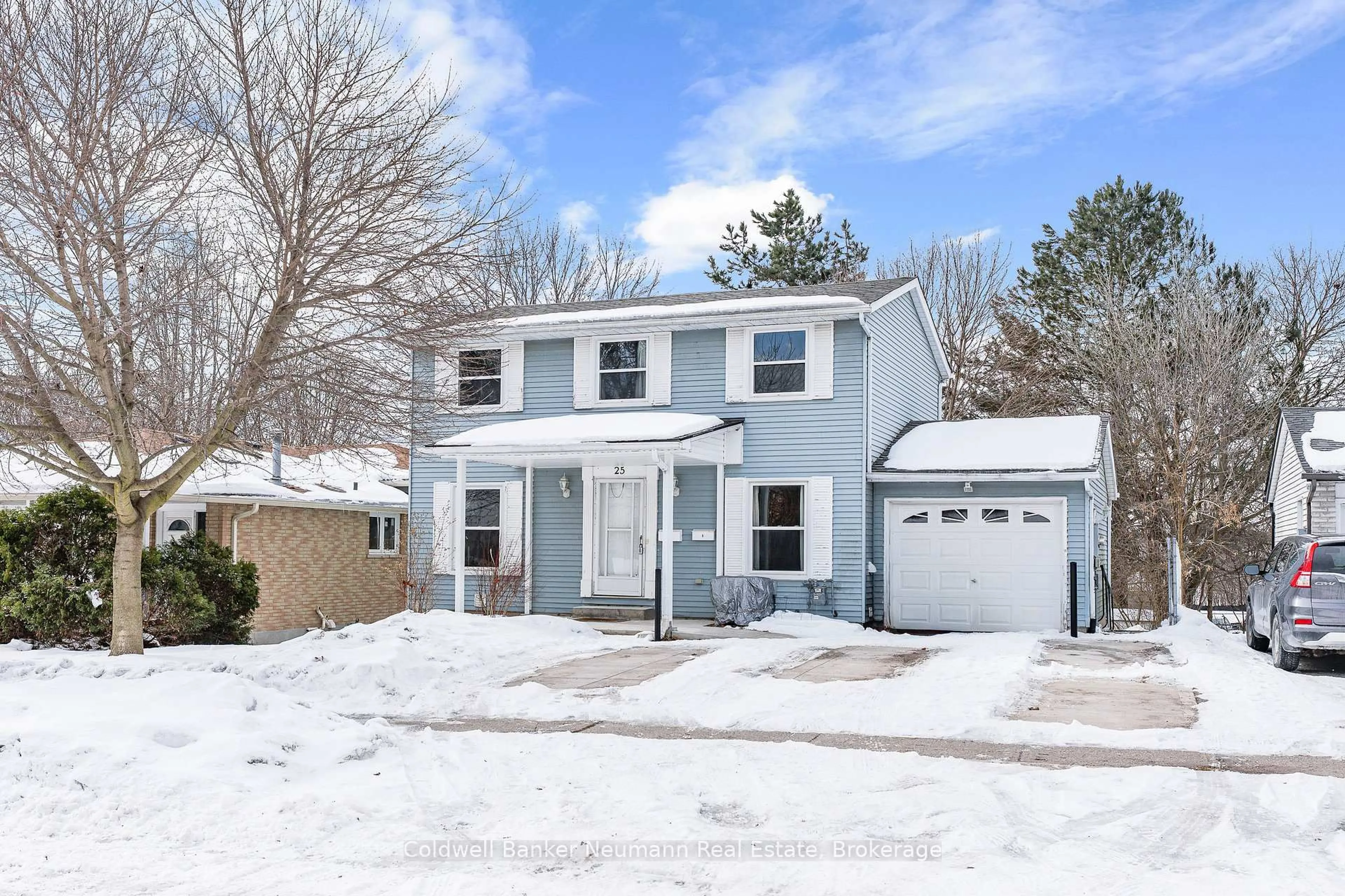 Home with vinyl exterior material, street for 25 Briarlea Rd, Guelph Ontario N1G 3H4