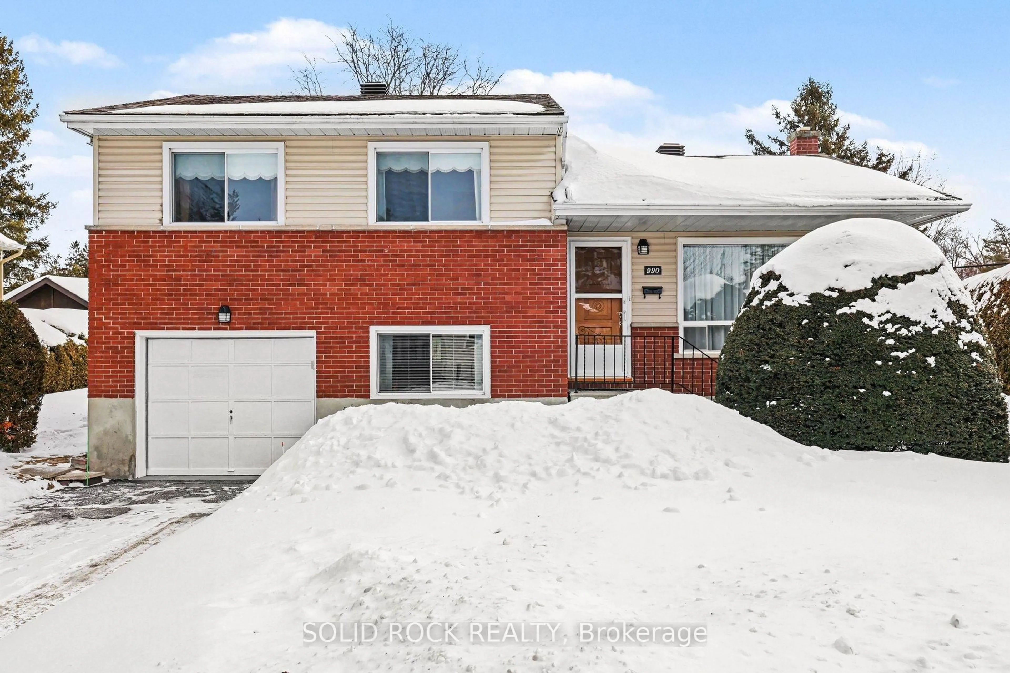 Home with brick exterior material, street for 990 Harkness Ave, Ottawa Ontario K1V 6P2