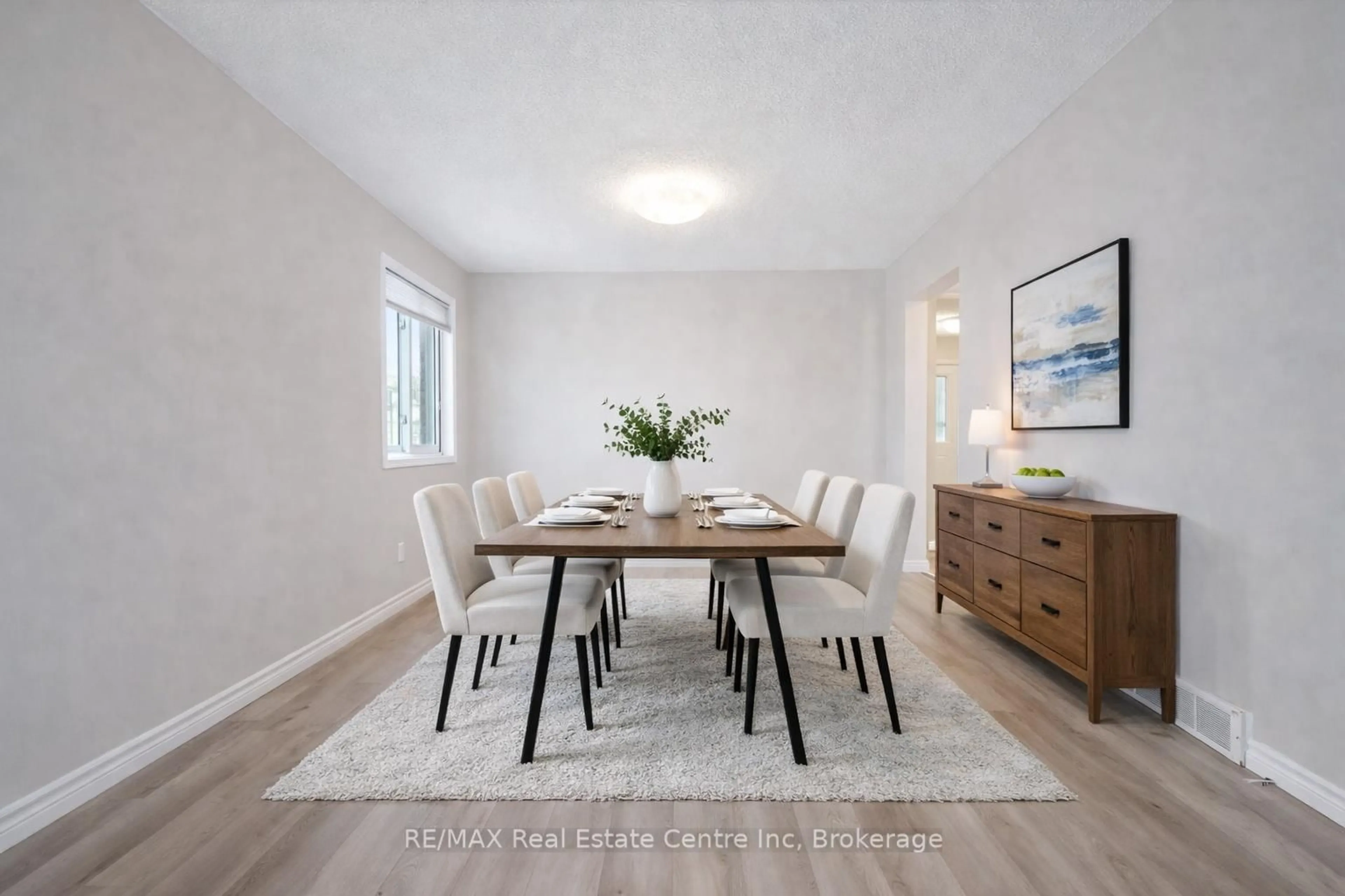 Dining room, wood/laminate floor for 42 Tara Cres, Kitchener Ontario N2E 3K9