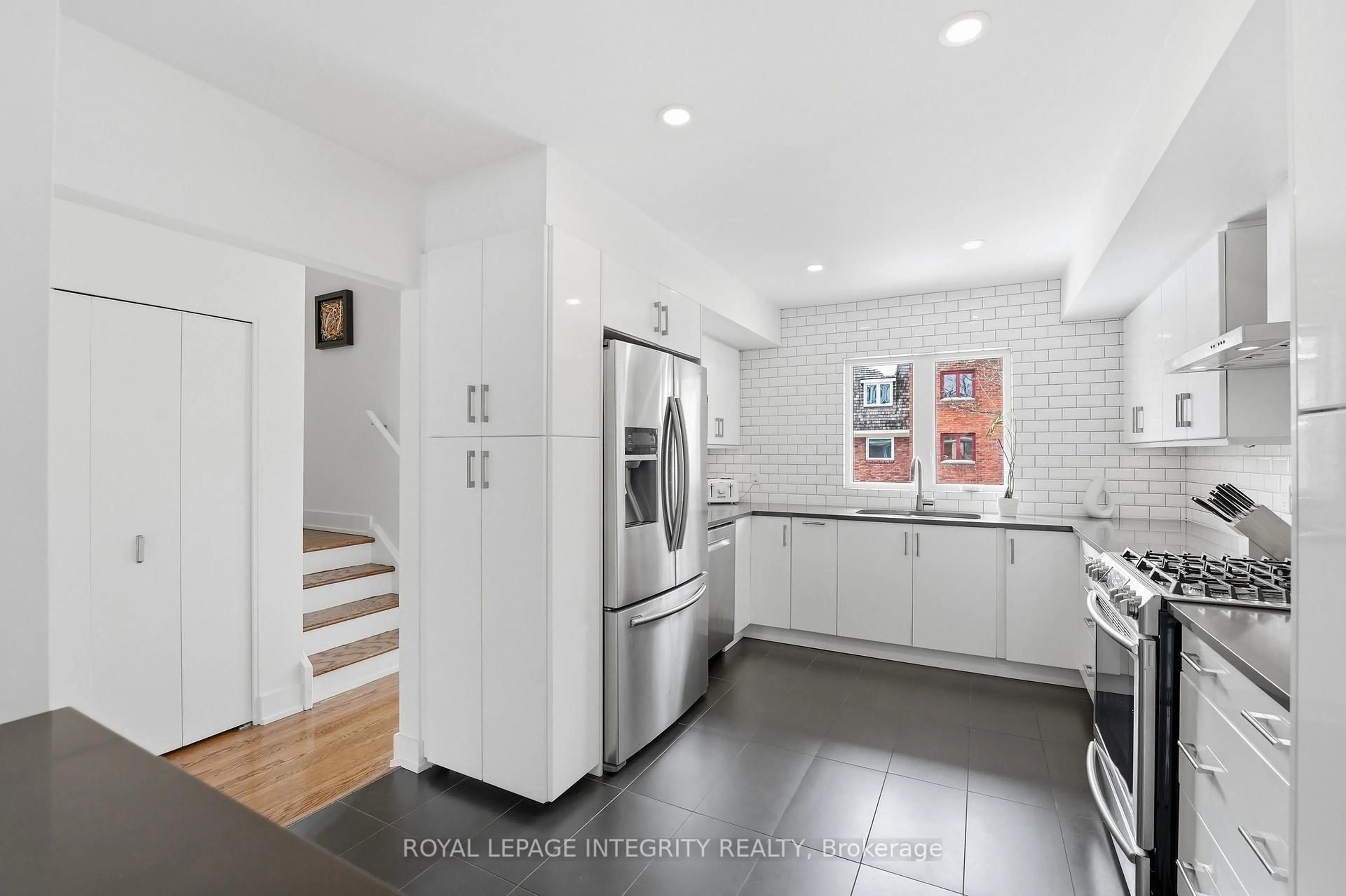 Open concept kitchen, ceramic/tile floor for 27 Marco Lane, Ottawa Ontario K1S 5A1