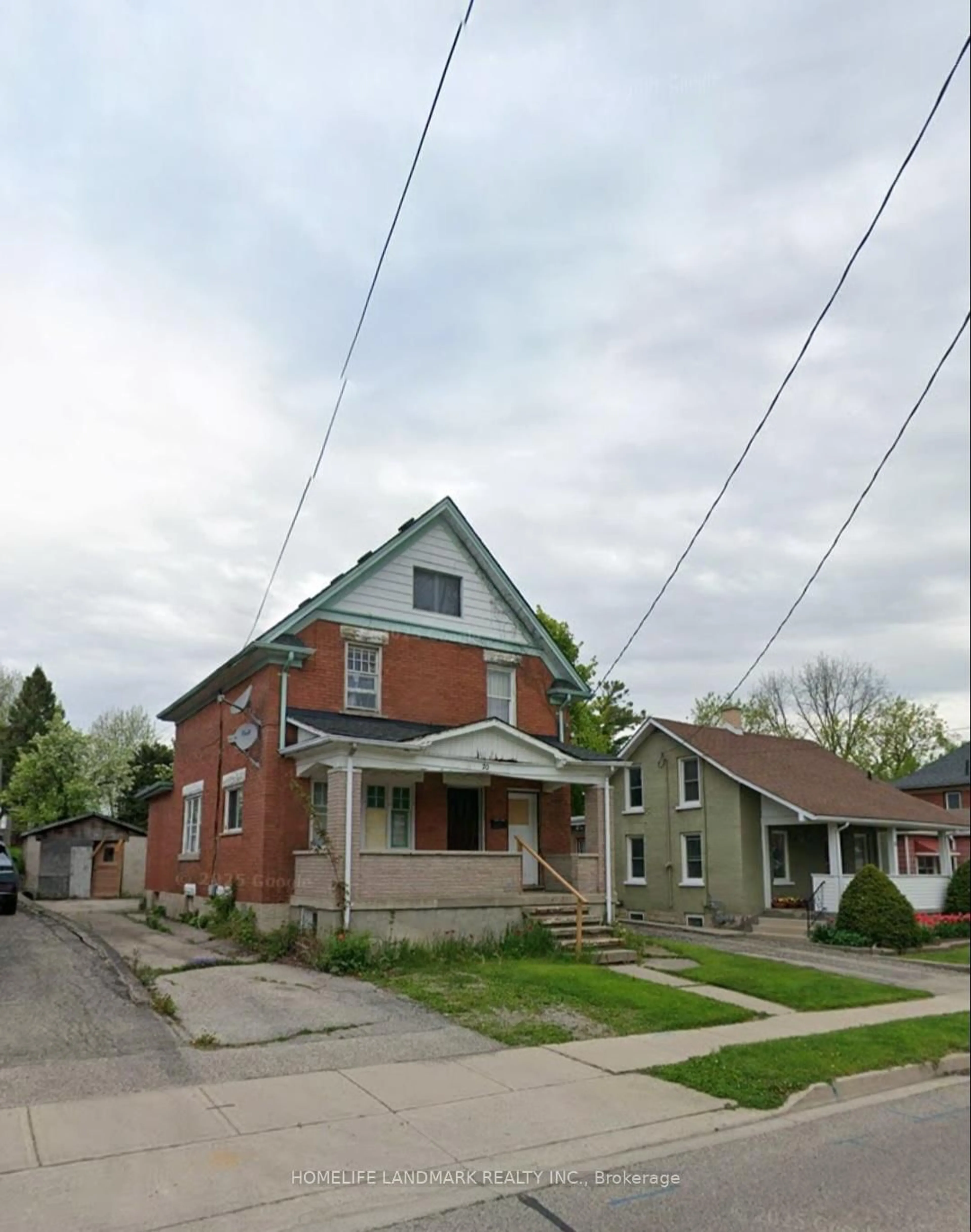 Home with brick exterior material, street for 20 Cherry St, Kitchener Ontario N2G 2C5