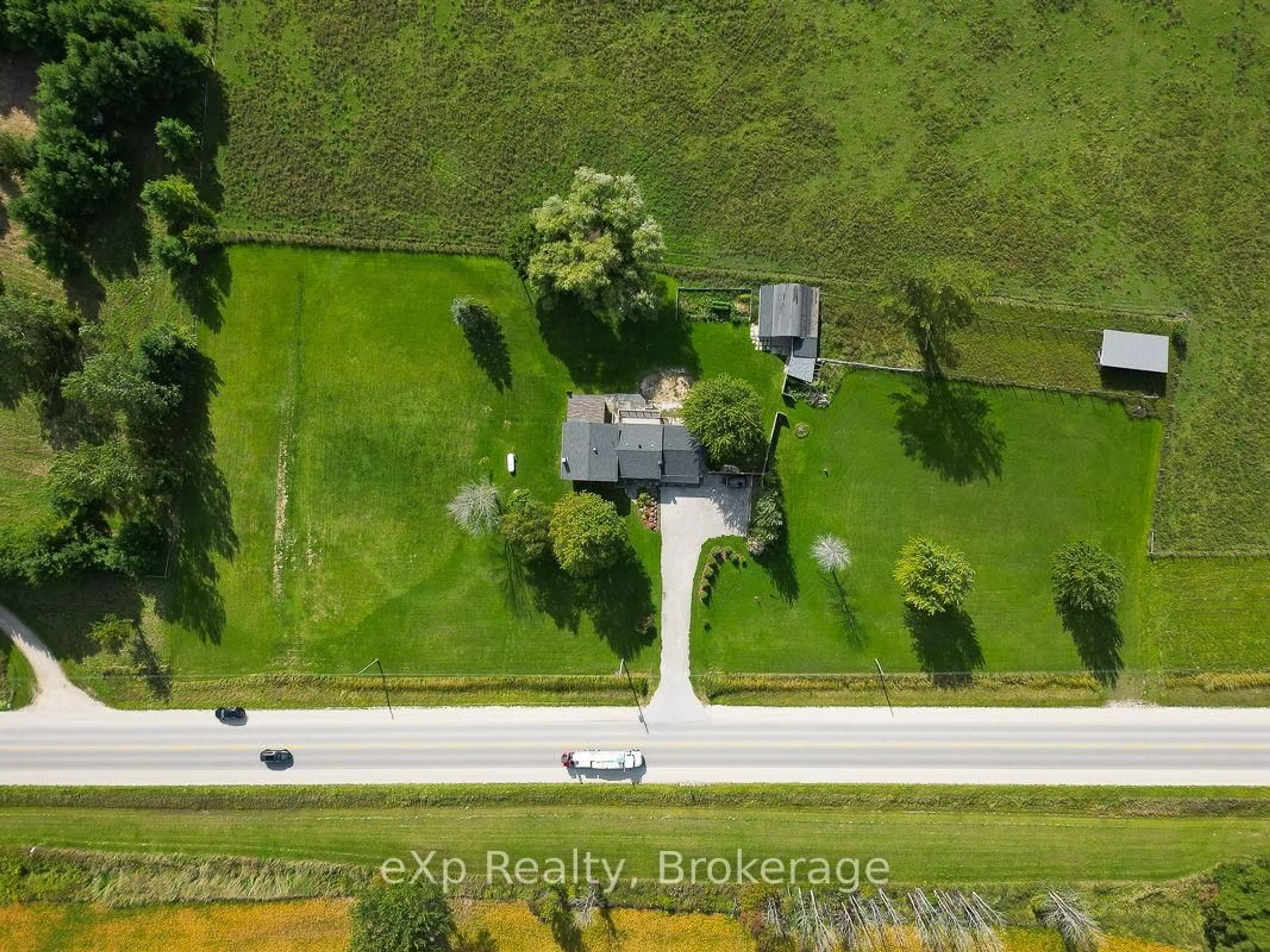 A pic from outside/outdoor area/front of a property/back of a property/a pic from drone, street for 3595 Bruce Road 3, Saugeen Shores Ontario N0G 2N0