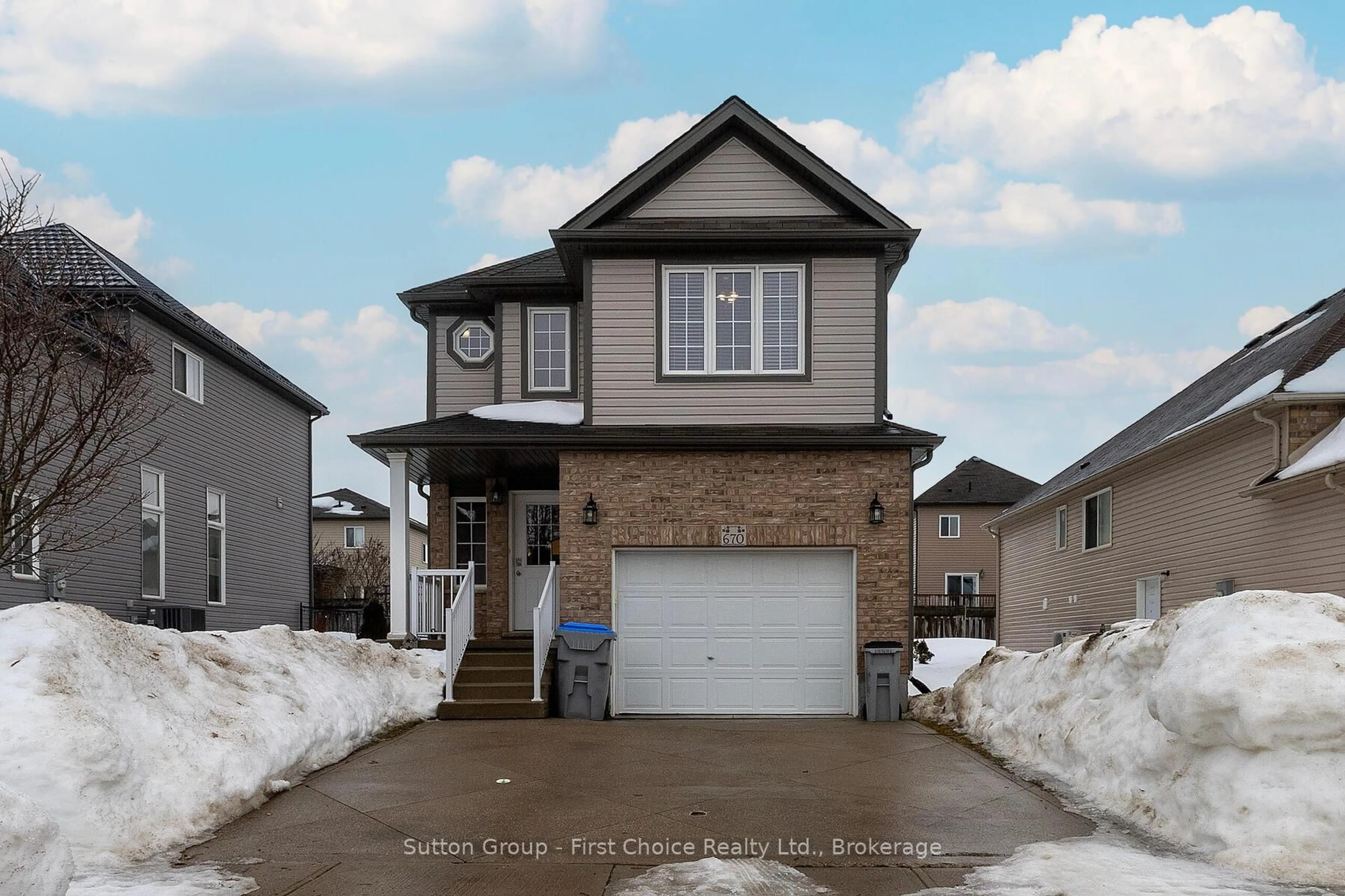 Home with vinyl exterior material, street for 670 Reid Cres, North Perth Ontario N4W 0A1