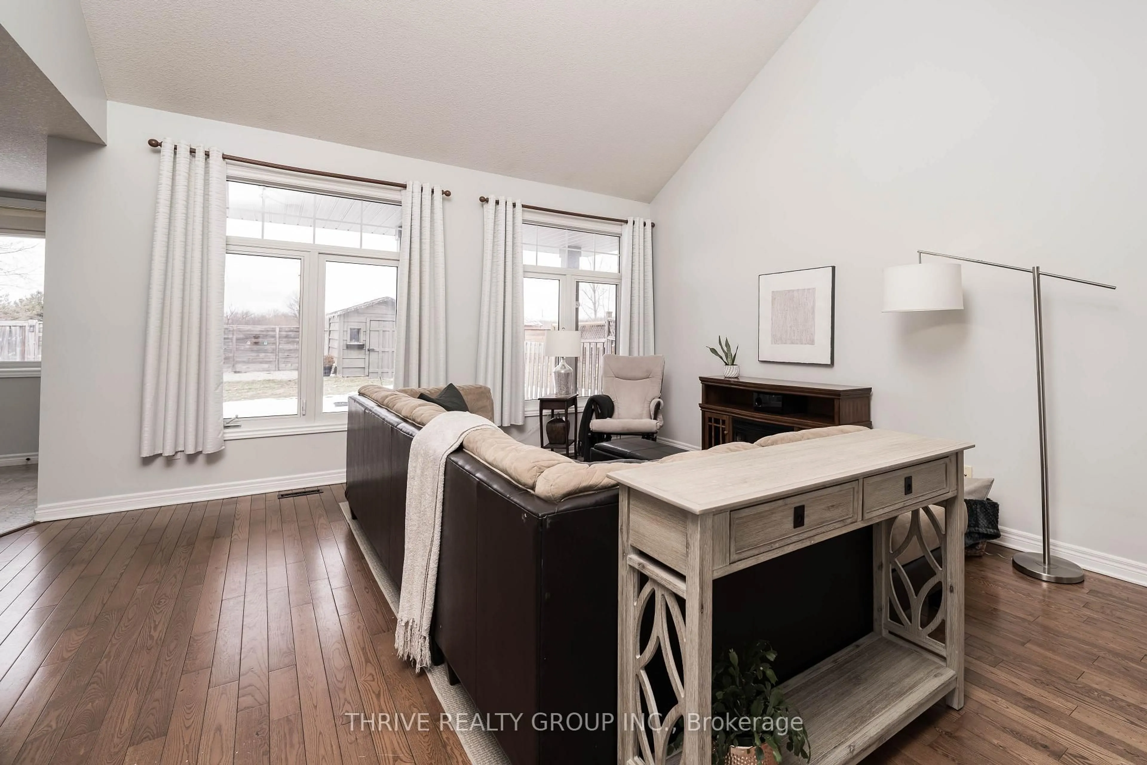 Living room with furniture, wood/laminate floor for 53 BROOKSIDE Dr, St. Thomas Ontario N5P 4P3