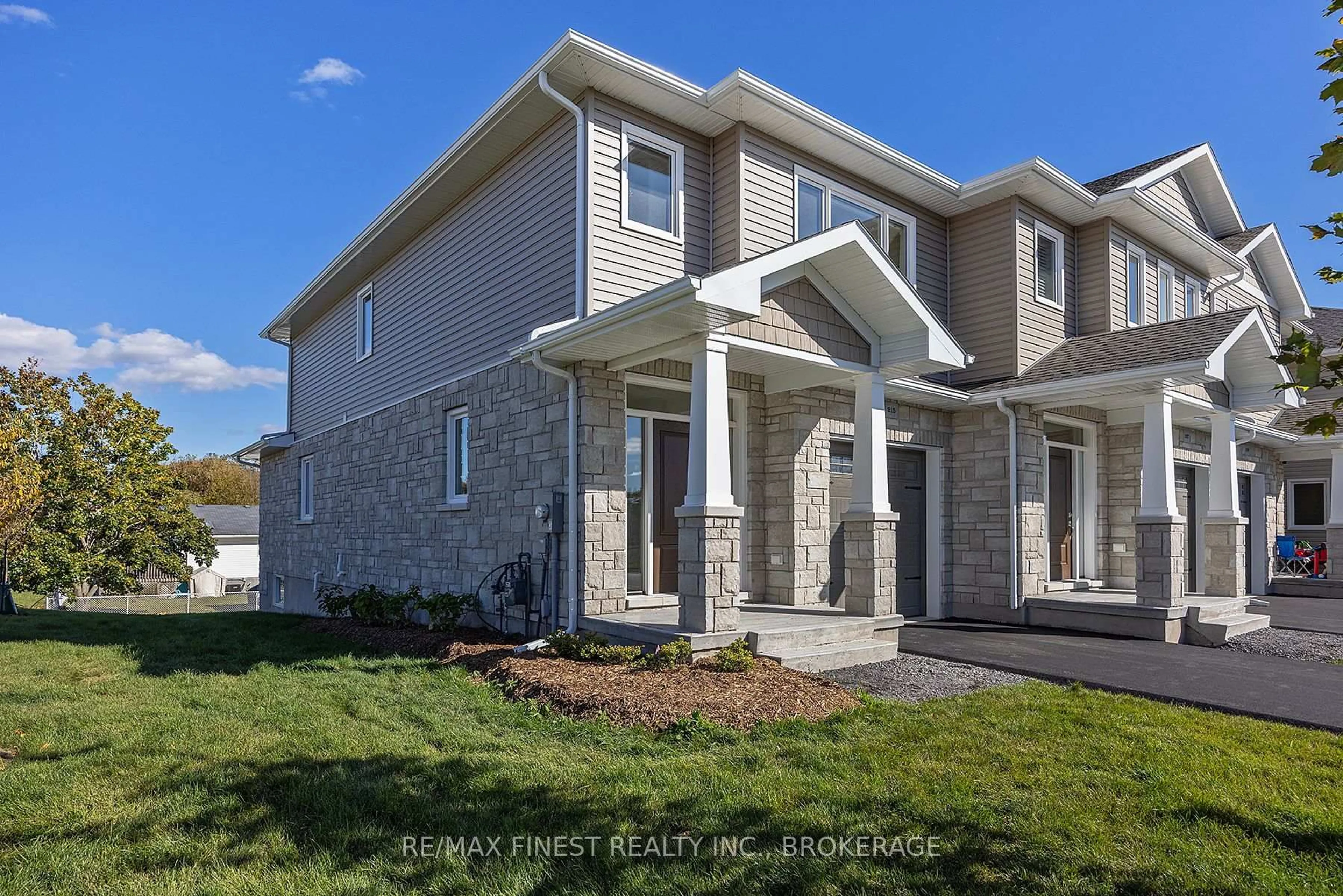 Home with brick exterior material, street for 215 HERITAGE PARK Dr, Greater Napanee Ontario K7R 3Y1