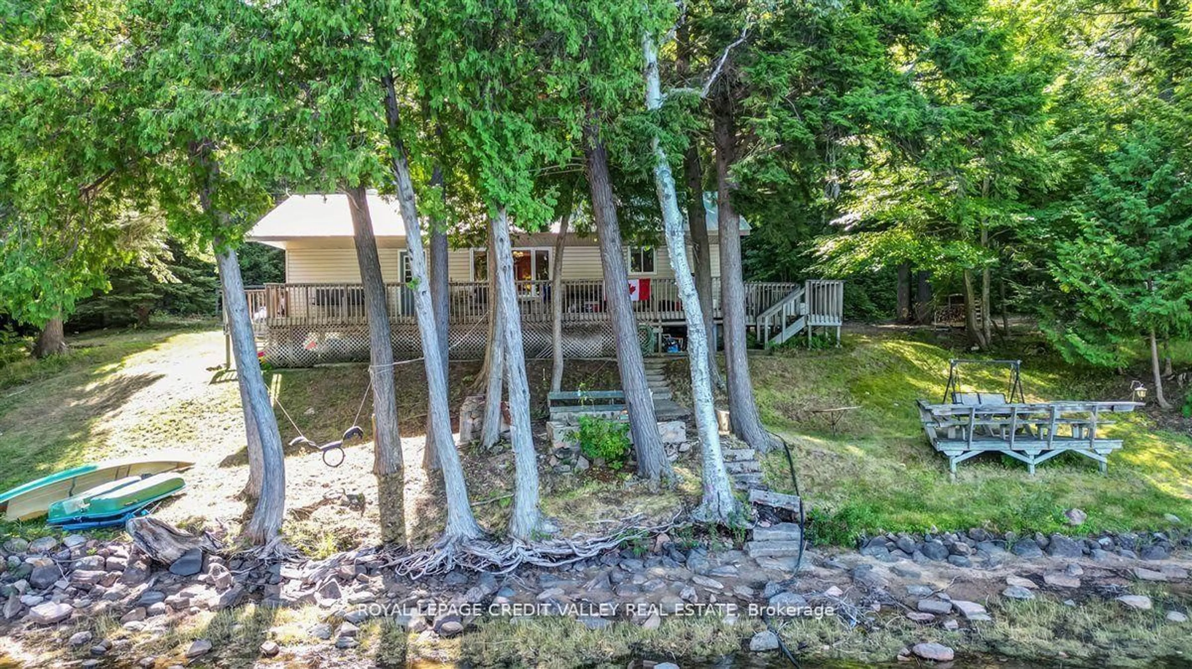 A pic from outside/outdoor area/front of a property/back of a property/a pic from drone, forest/trees view for 292 Caroline Crt, Bancroft Ontario K0L 1C0