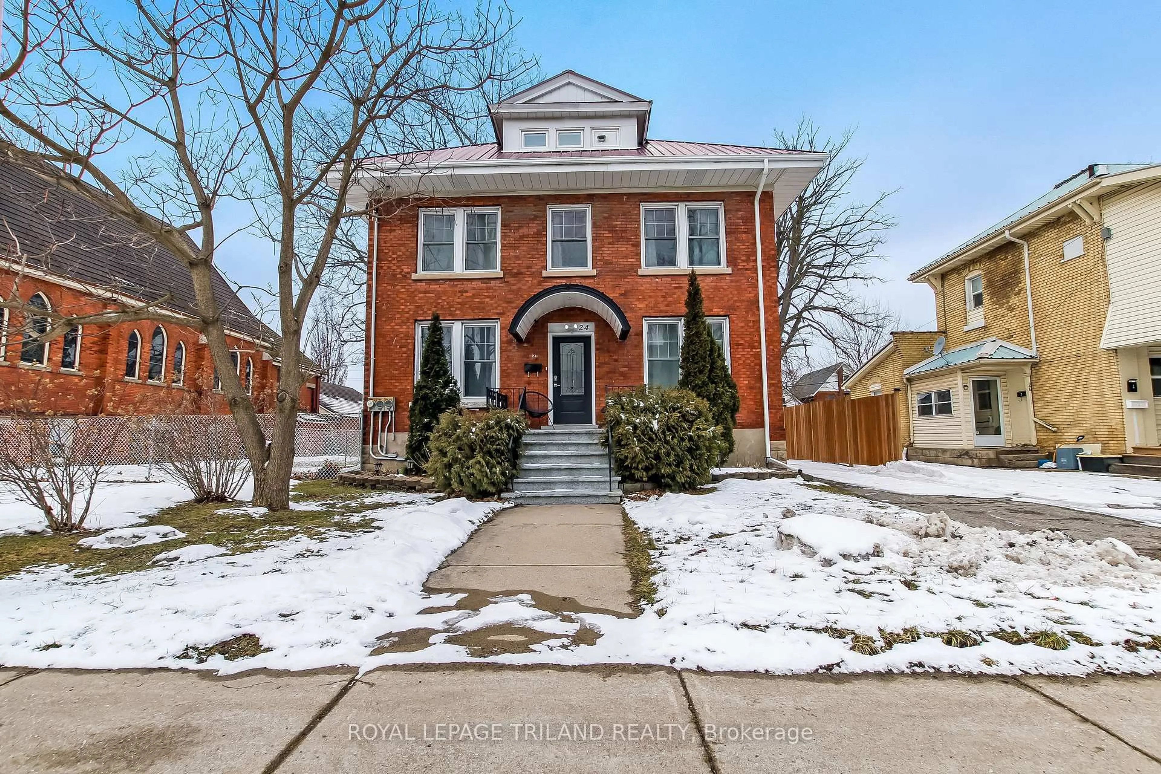 Home with brick exterior material, street for 24 Flora St, St. Thomas Ontario N5P 2X4