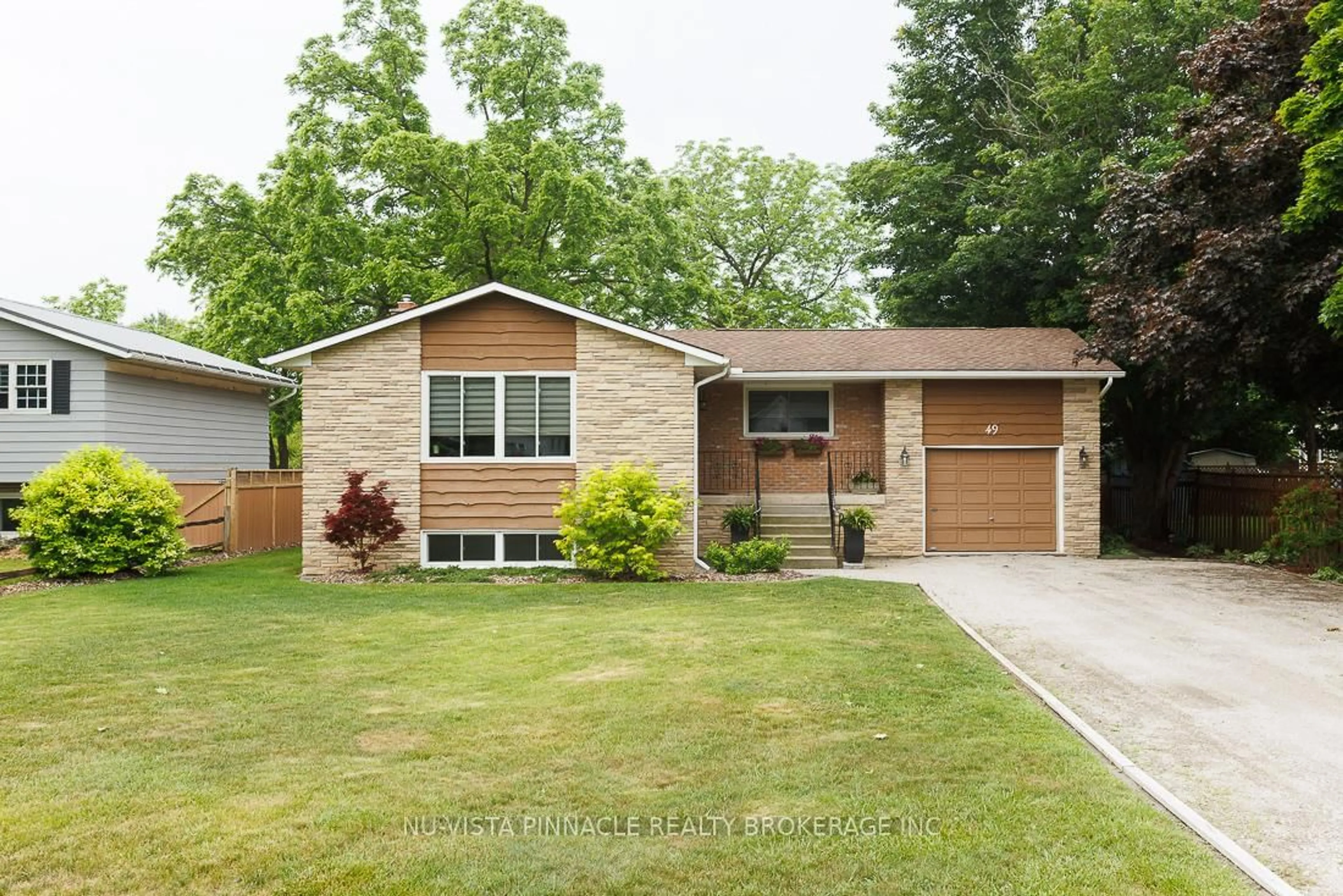 Home with vinyl exterior material, street for 49 Main St, Bluewater Ontario N0M 1G0