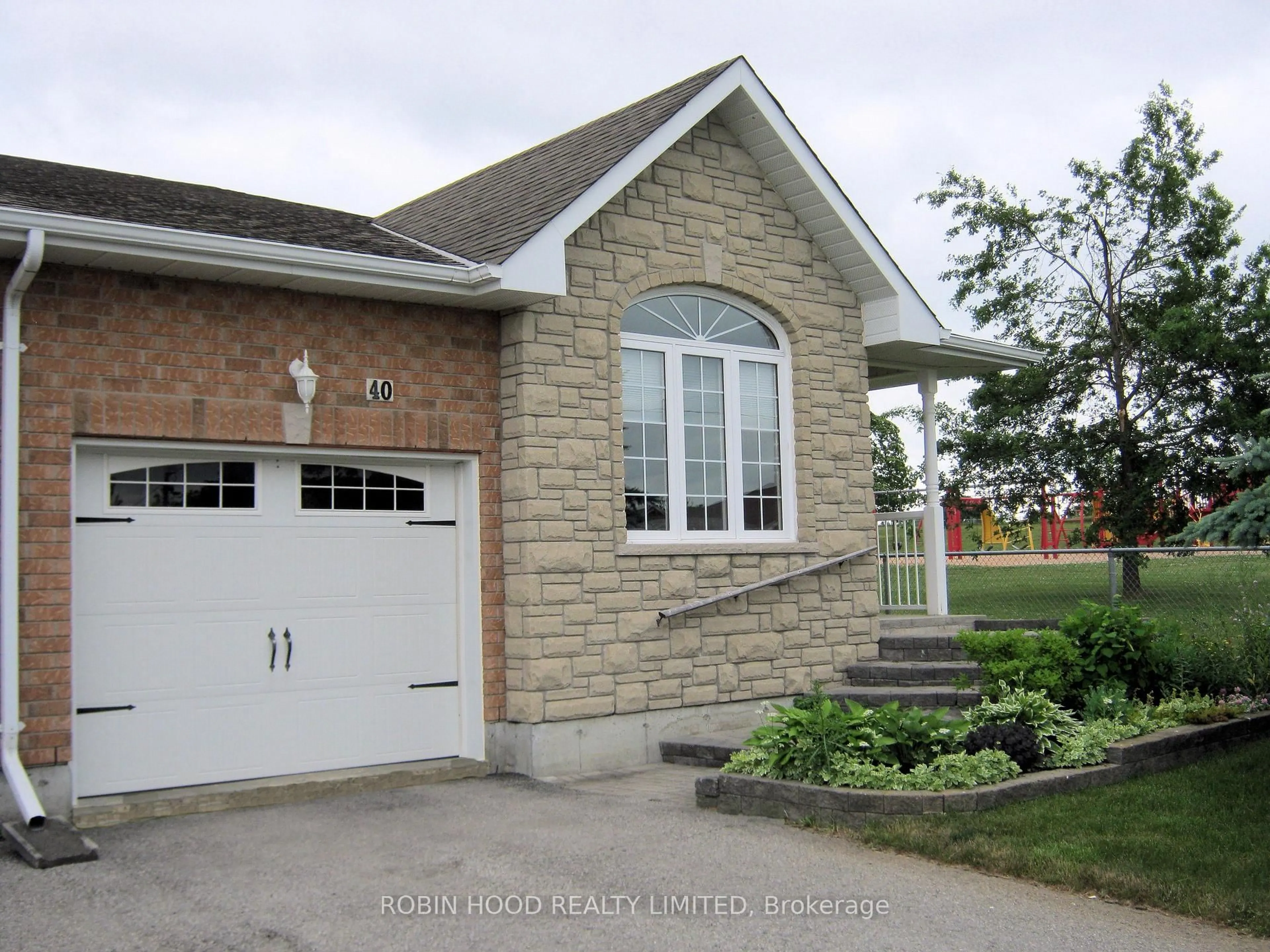 Home with brick exterior material, street for 40 Dormer Rd, Kawartha Lakes Ontario K9V 6H8